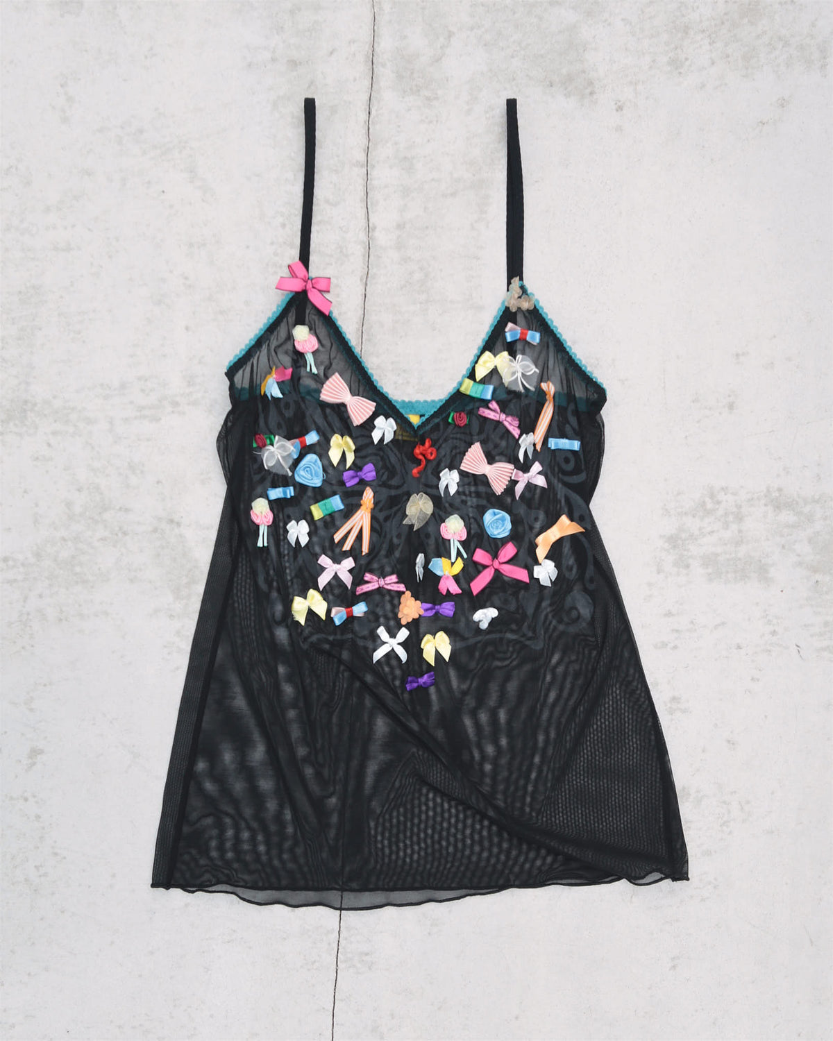 mesh top with colourful bows and butterfly print