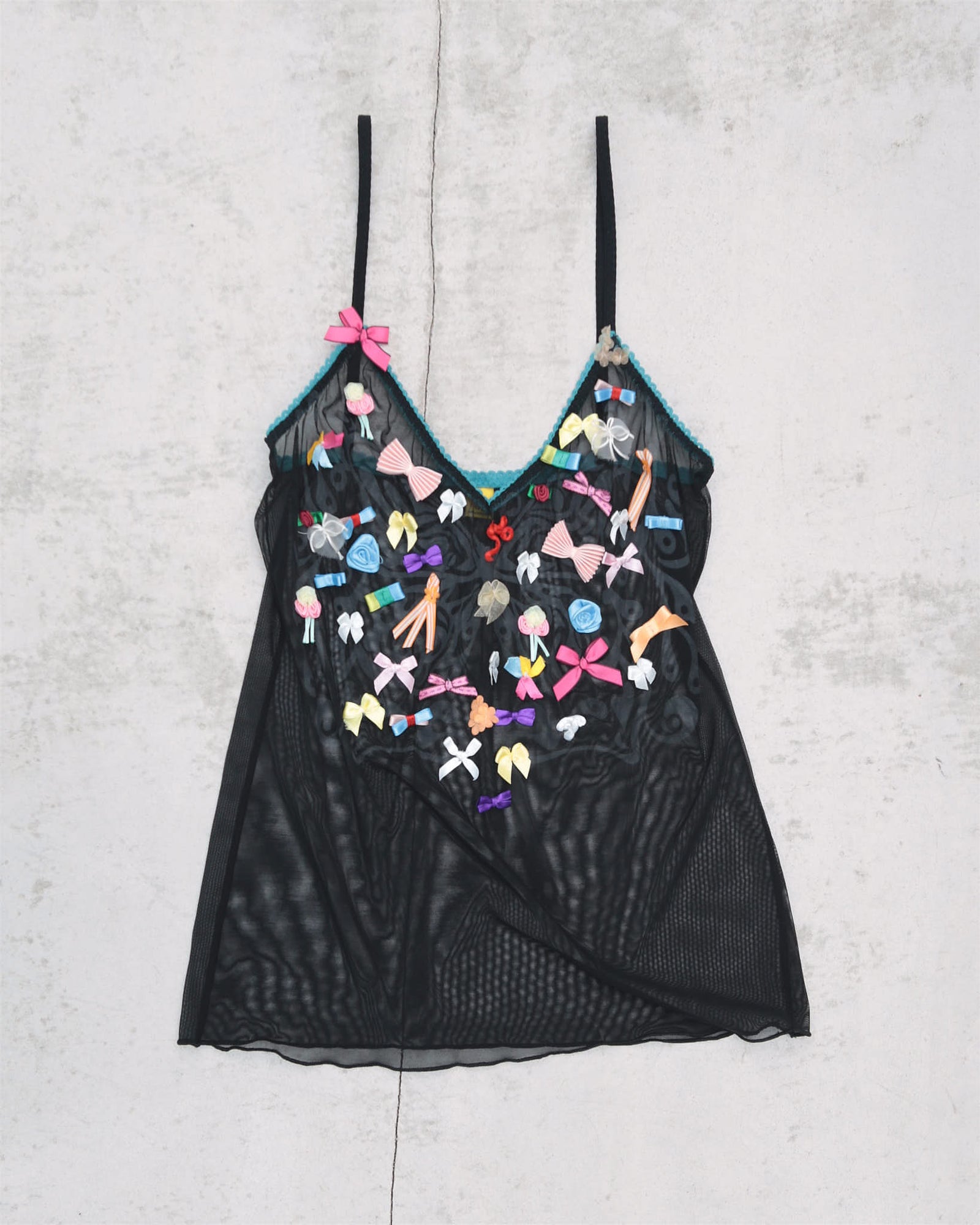 mesh top with colourful bows and butterfly print