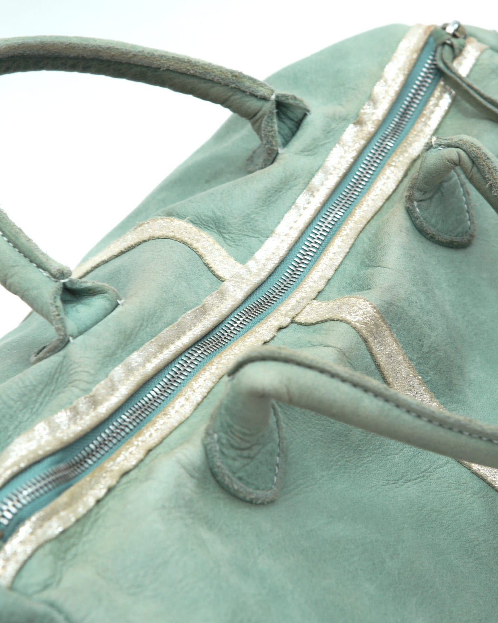 mint green leather duffle bag