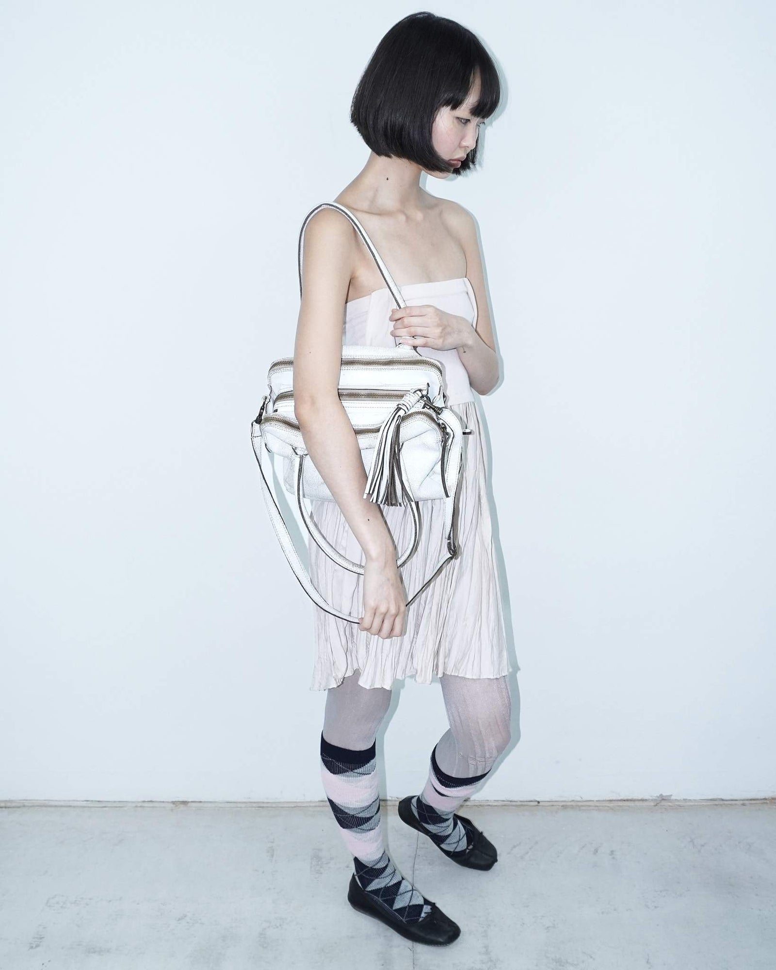 multi zipper distressed white leather bag