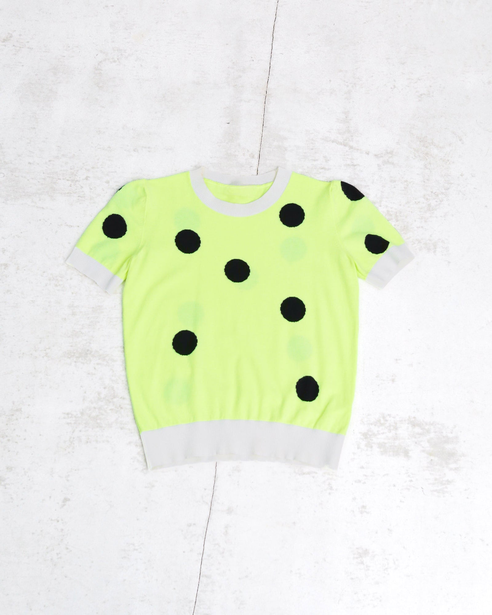 neon yellow top with polka dots