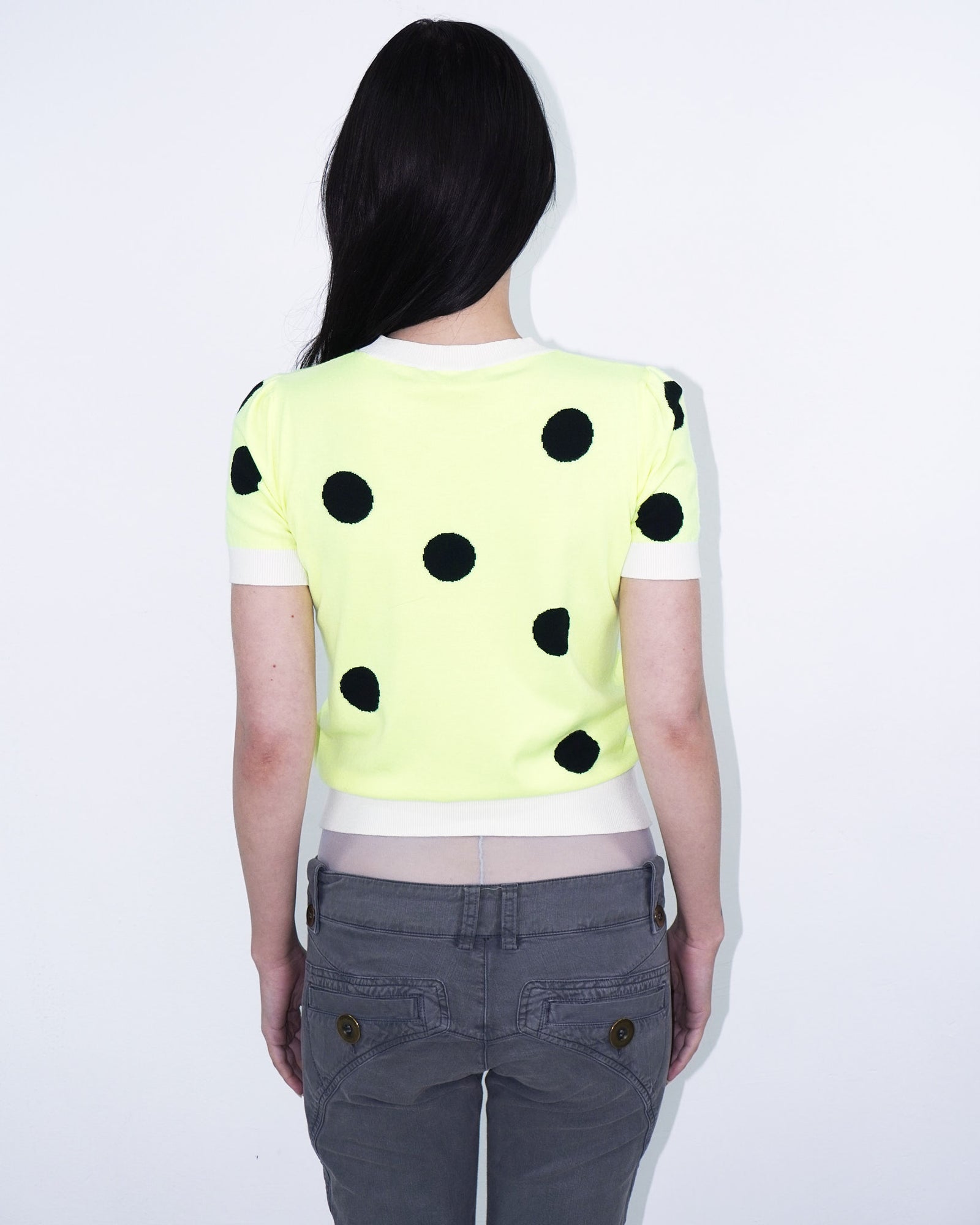 neon yellow top with polka dots