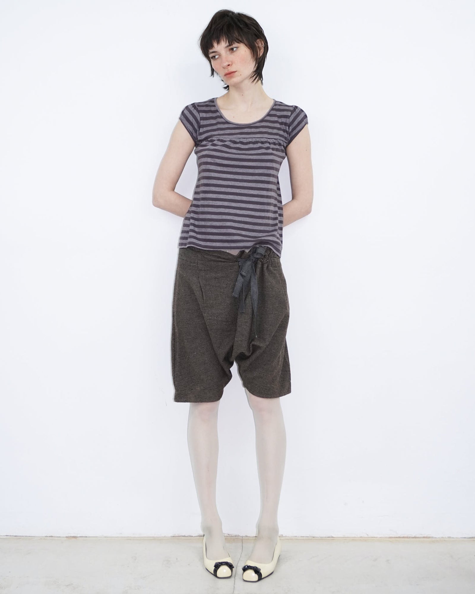 off white patent ballet flats with bow