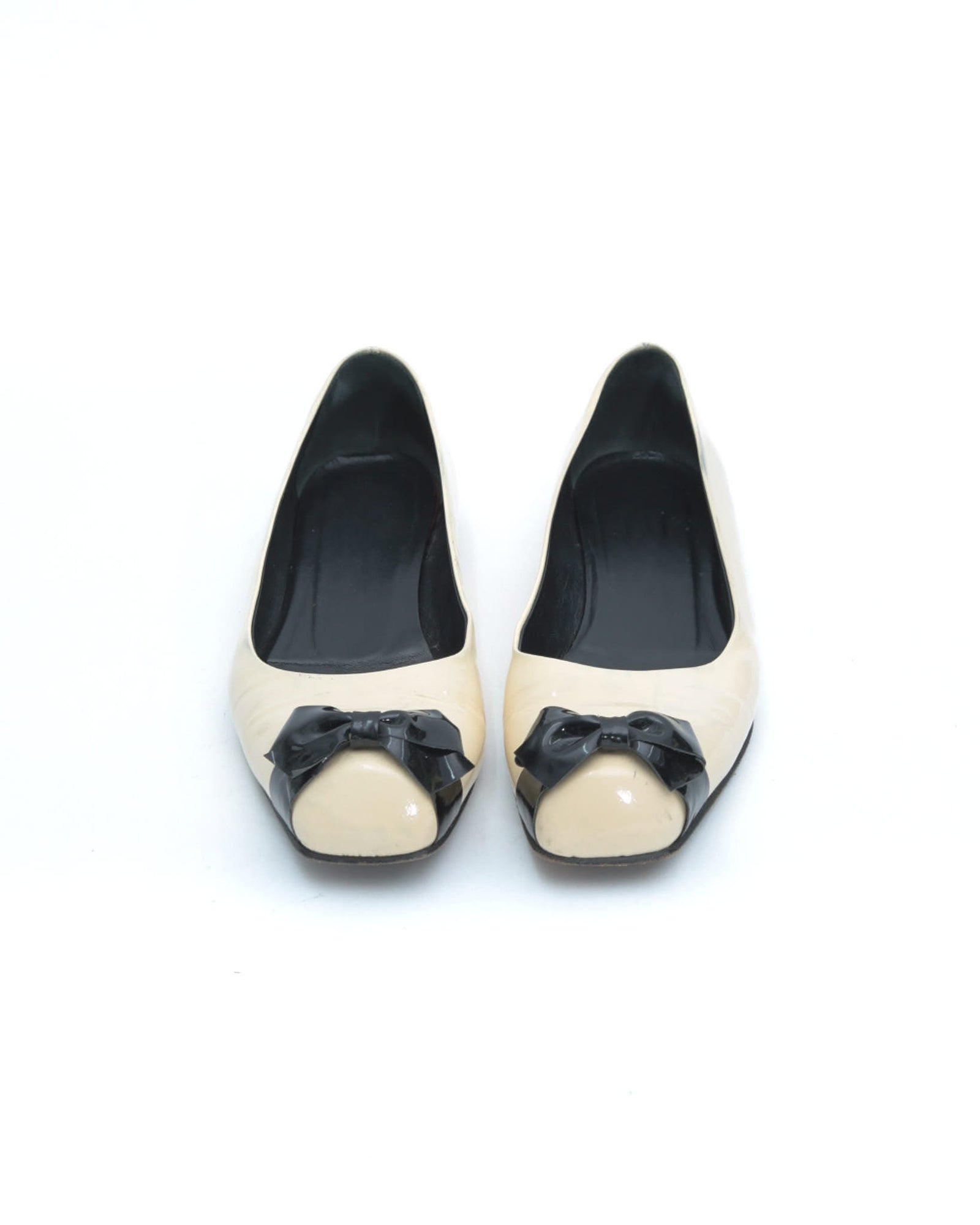 off white patent ballet flats with bow
