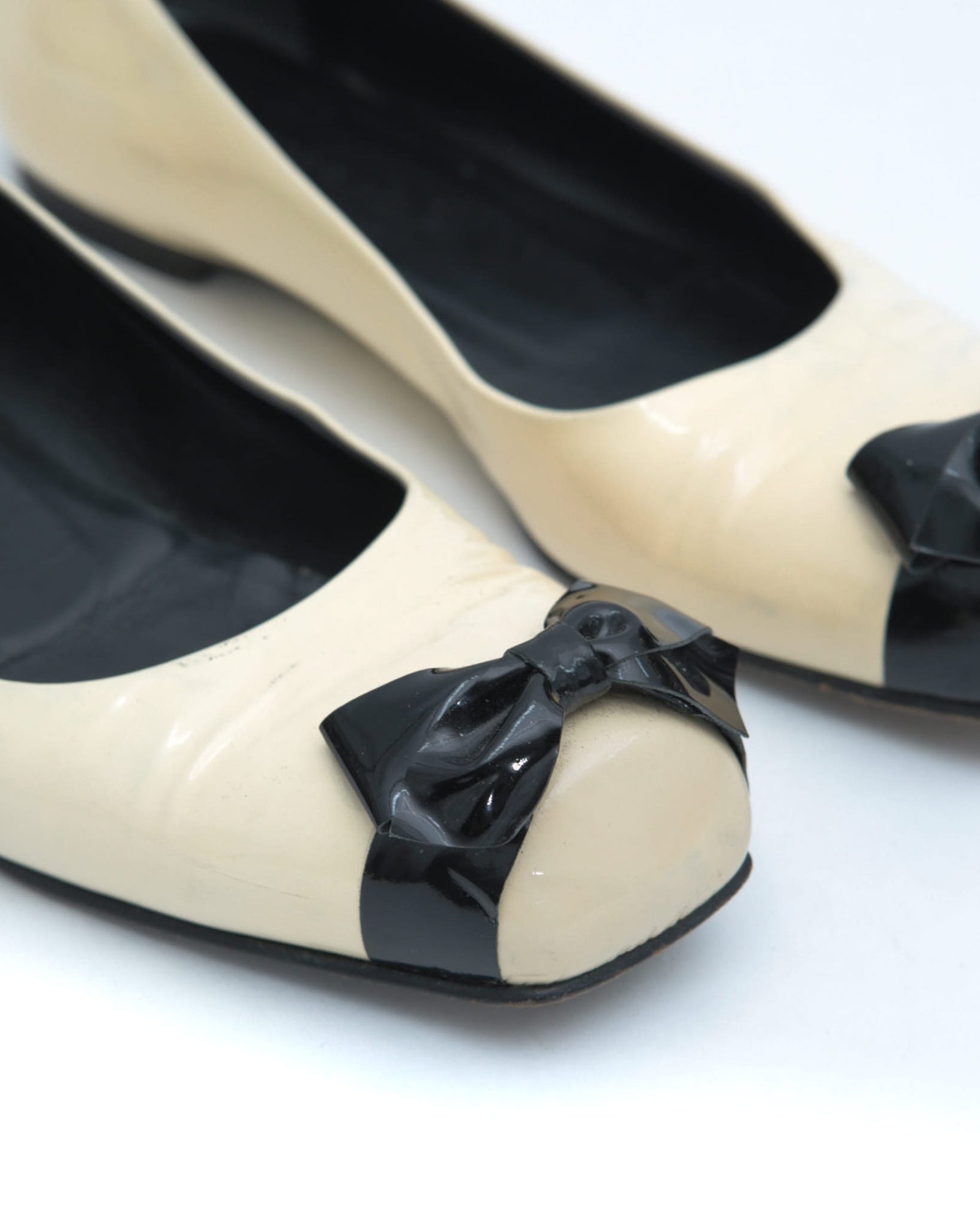 off white patent ballet flats with bow