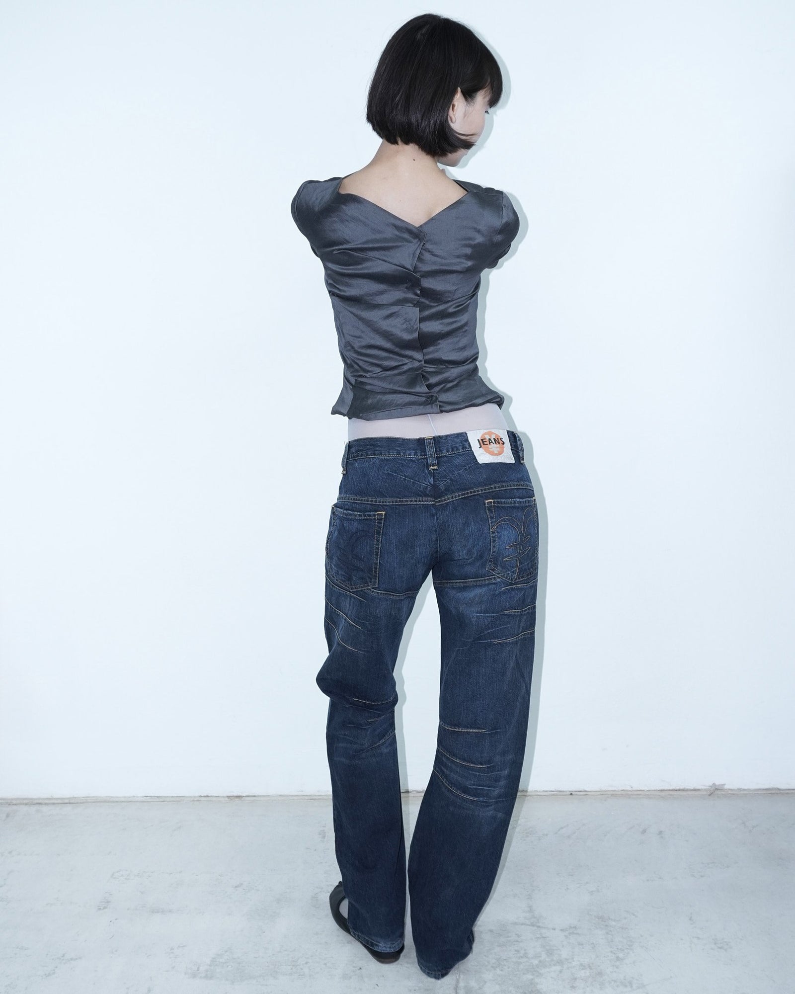 oversized denim pants with yellow stitching
