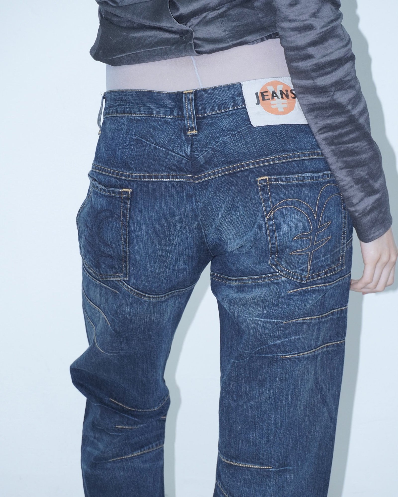 oversized denim pants with yellow stitching