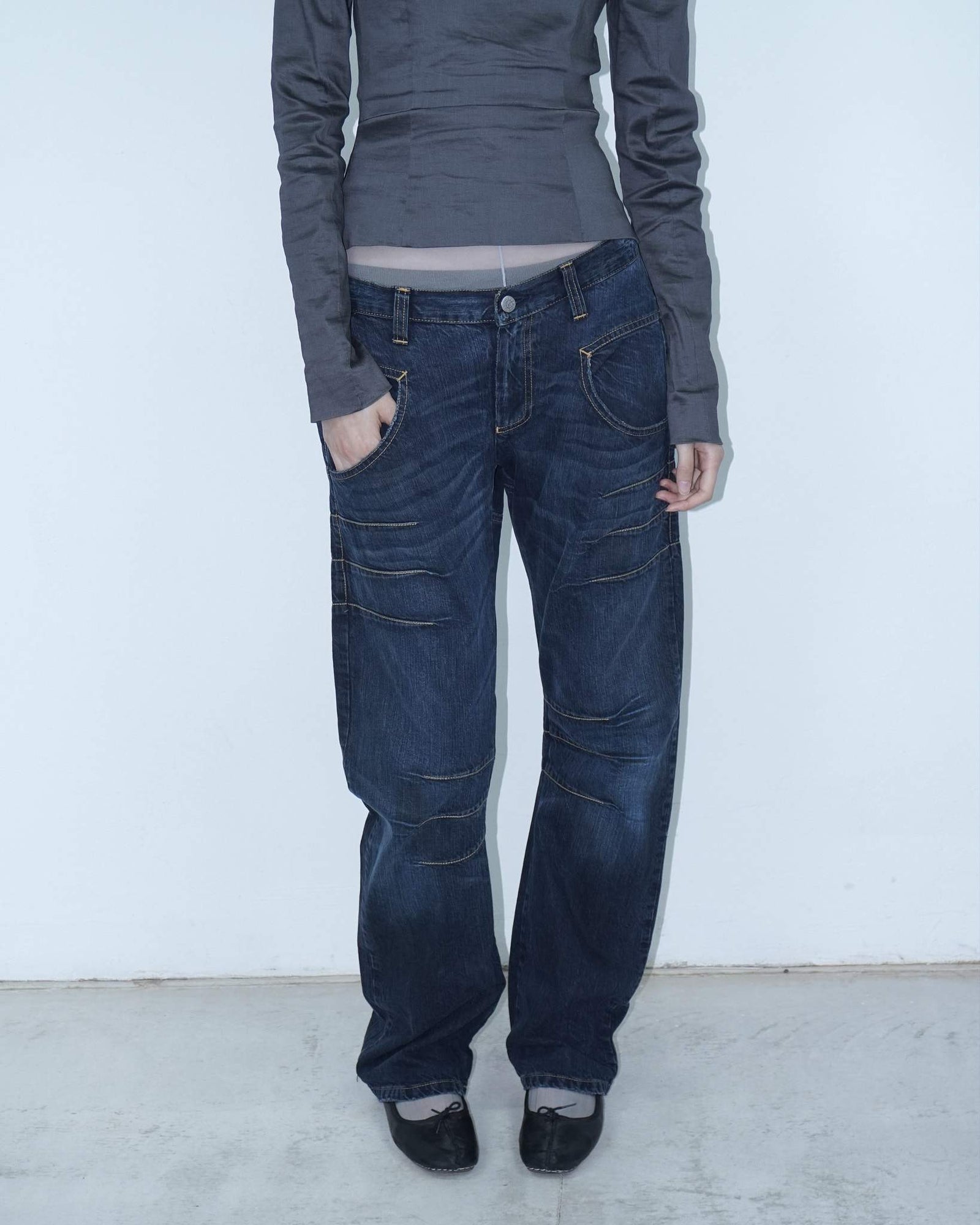 oversized denim pants with yellow stitching