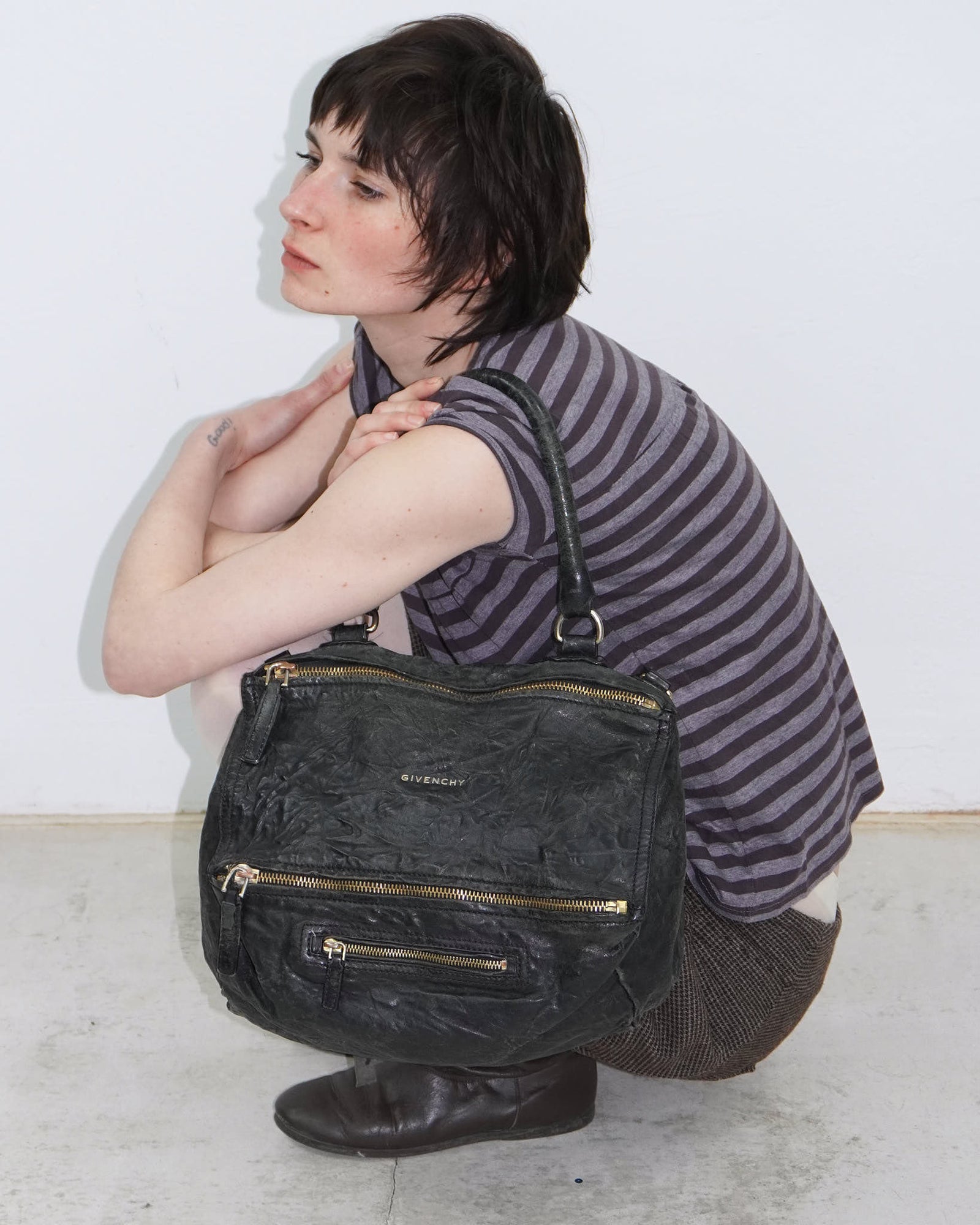 pandora black leather bag with golden hardware