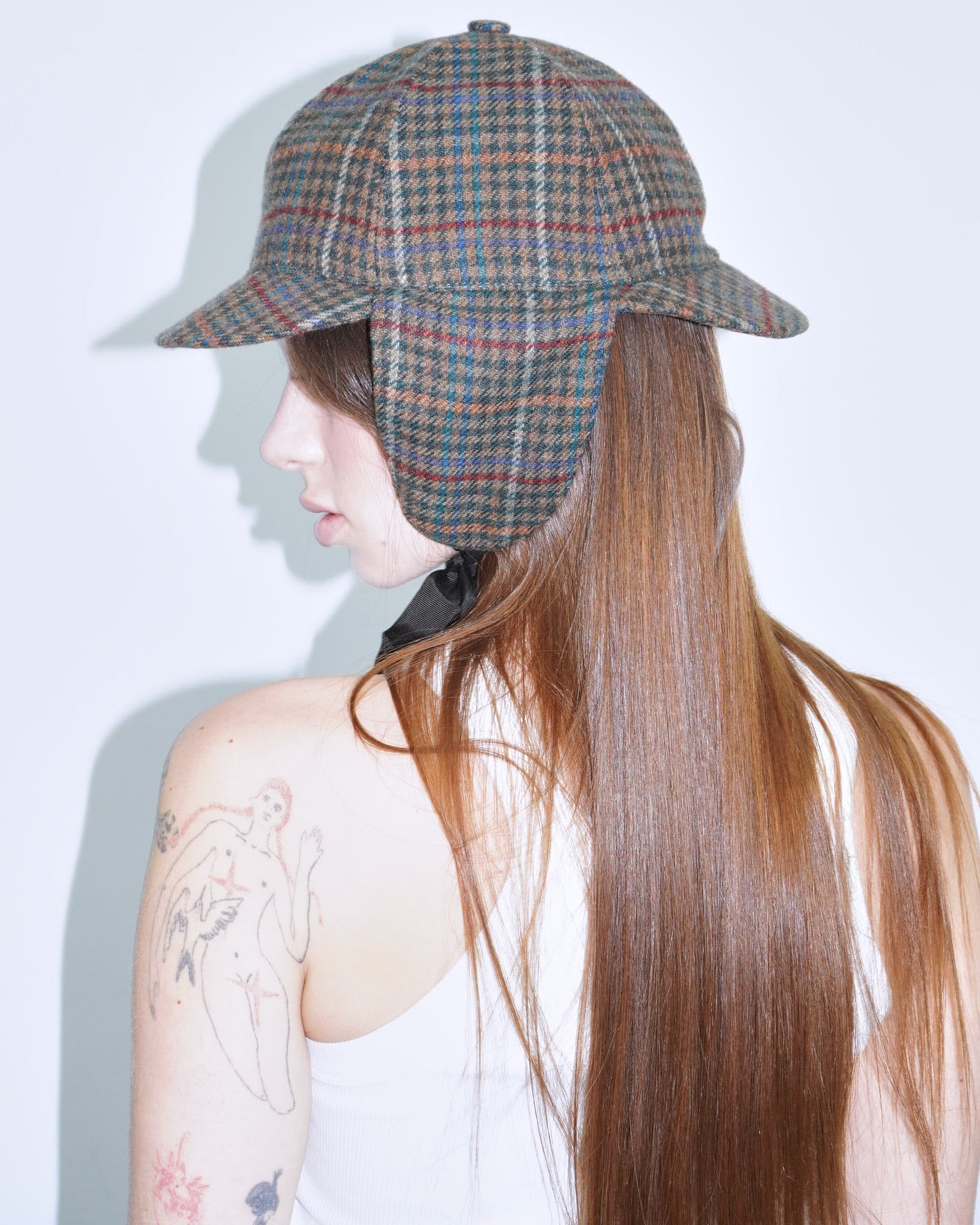plaid ear-flap cap