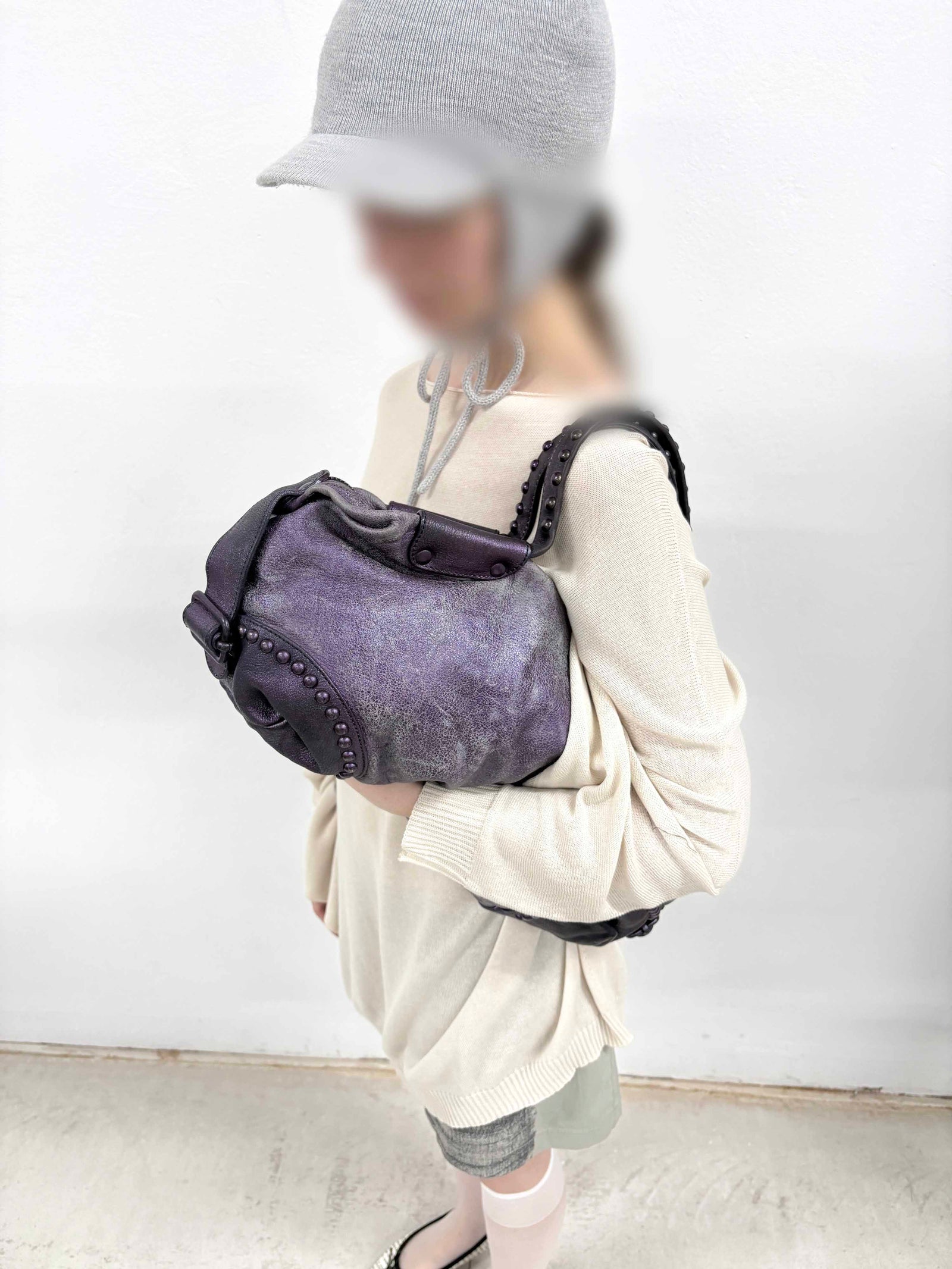 shiny medium purple leather bag