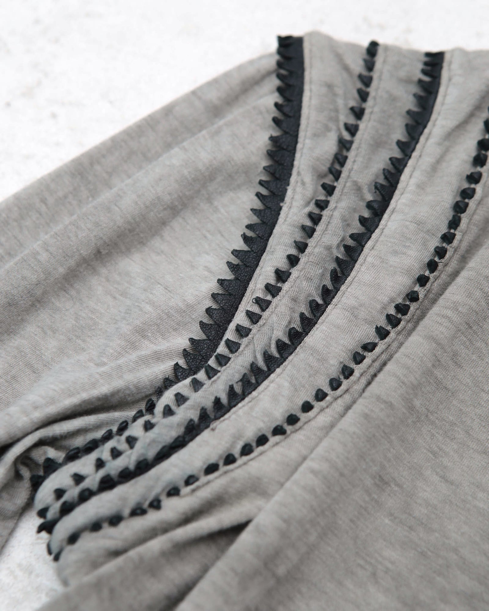 stone coloured top with shoulder detail