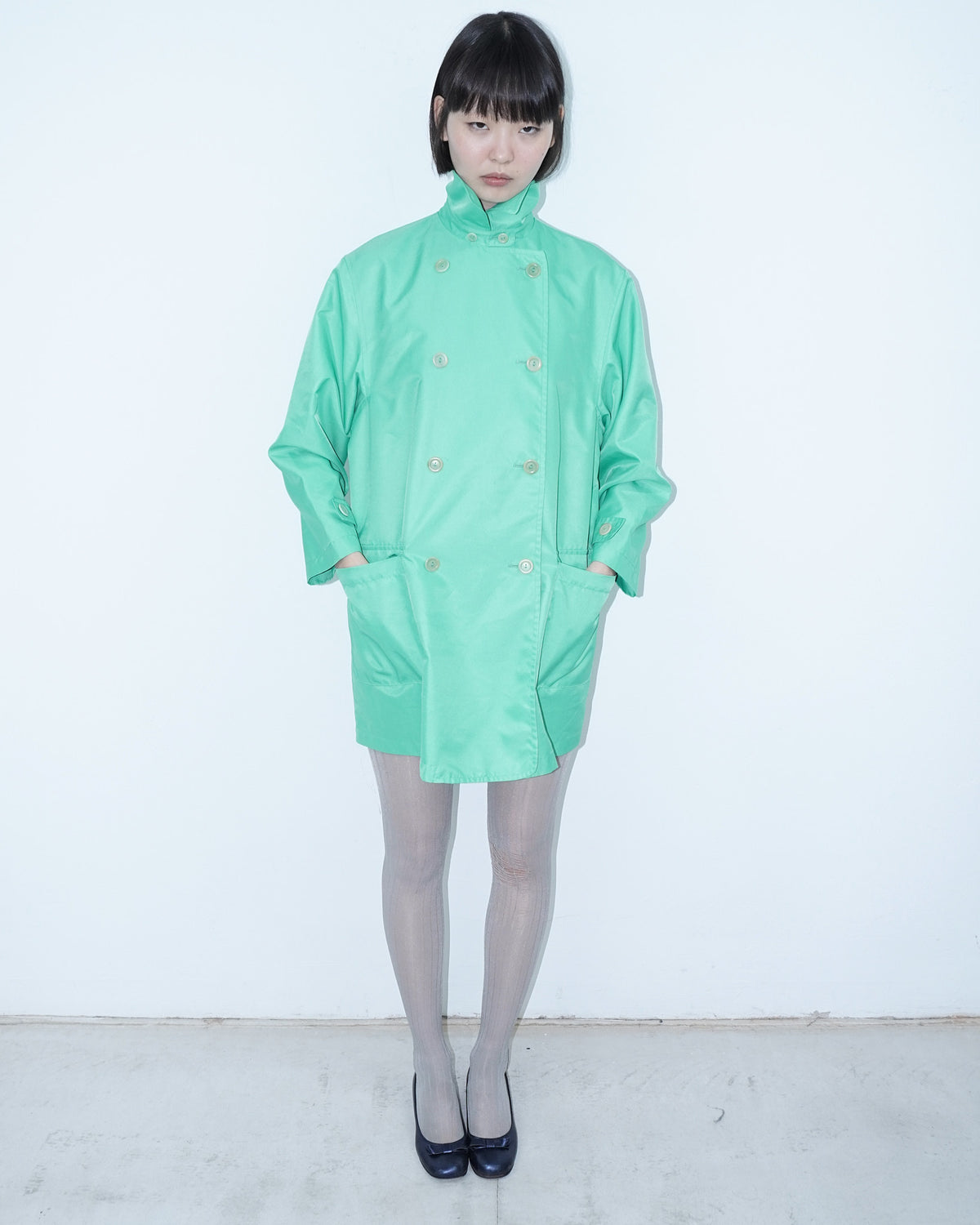 vibrant mint green trench coat