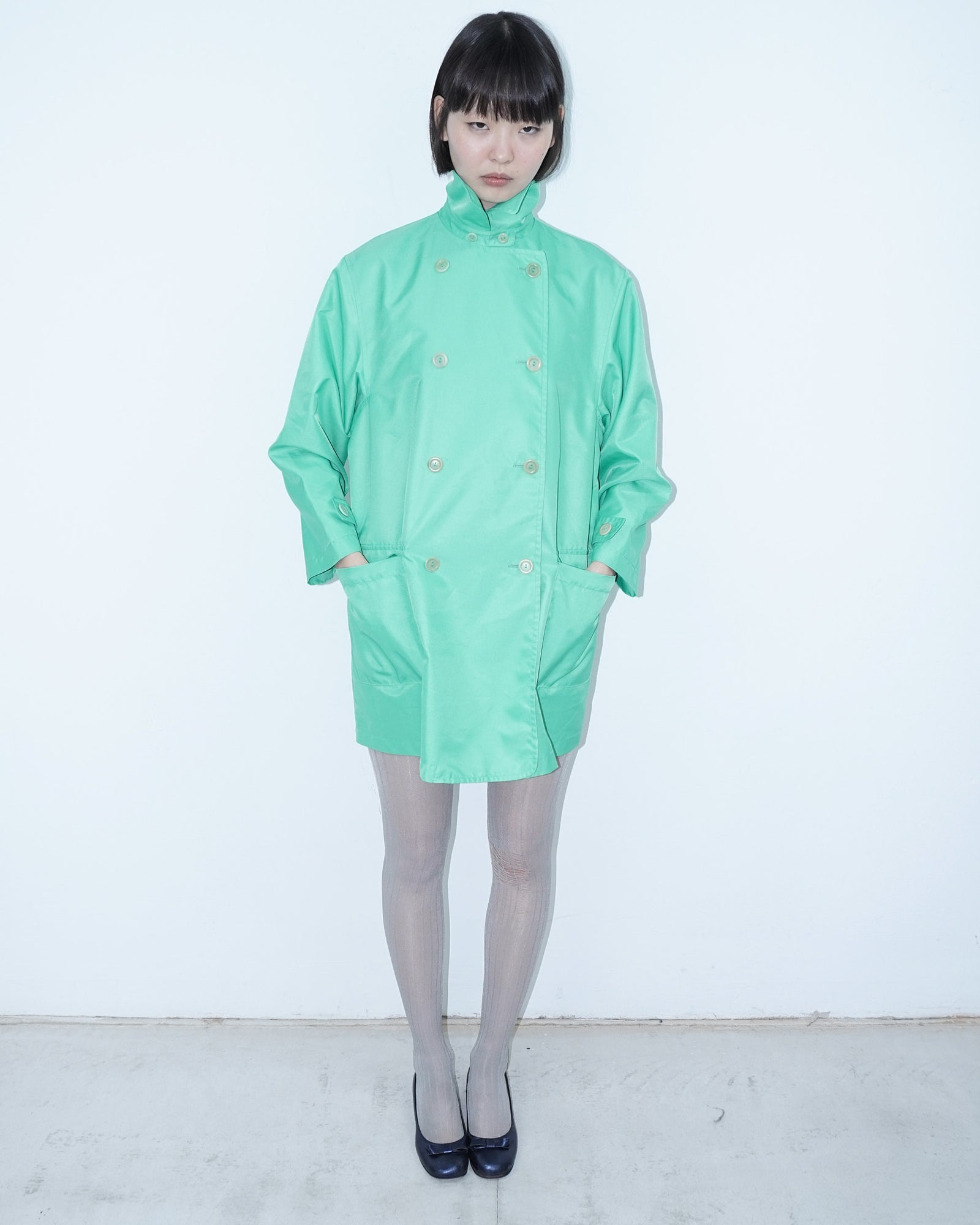vibrant mint green trench coat