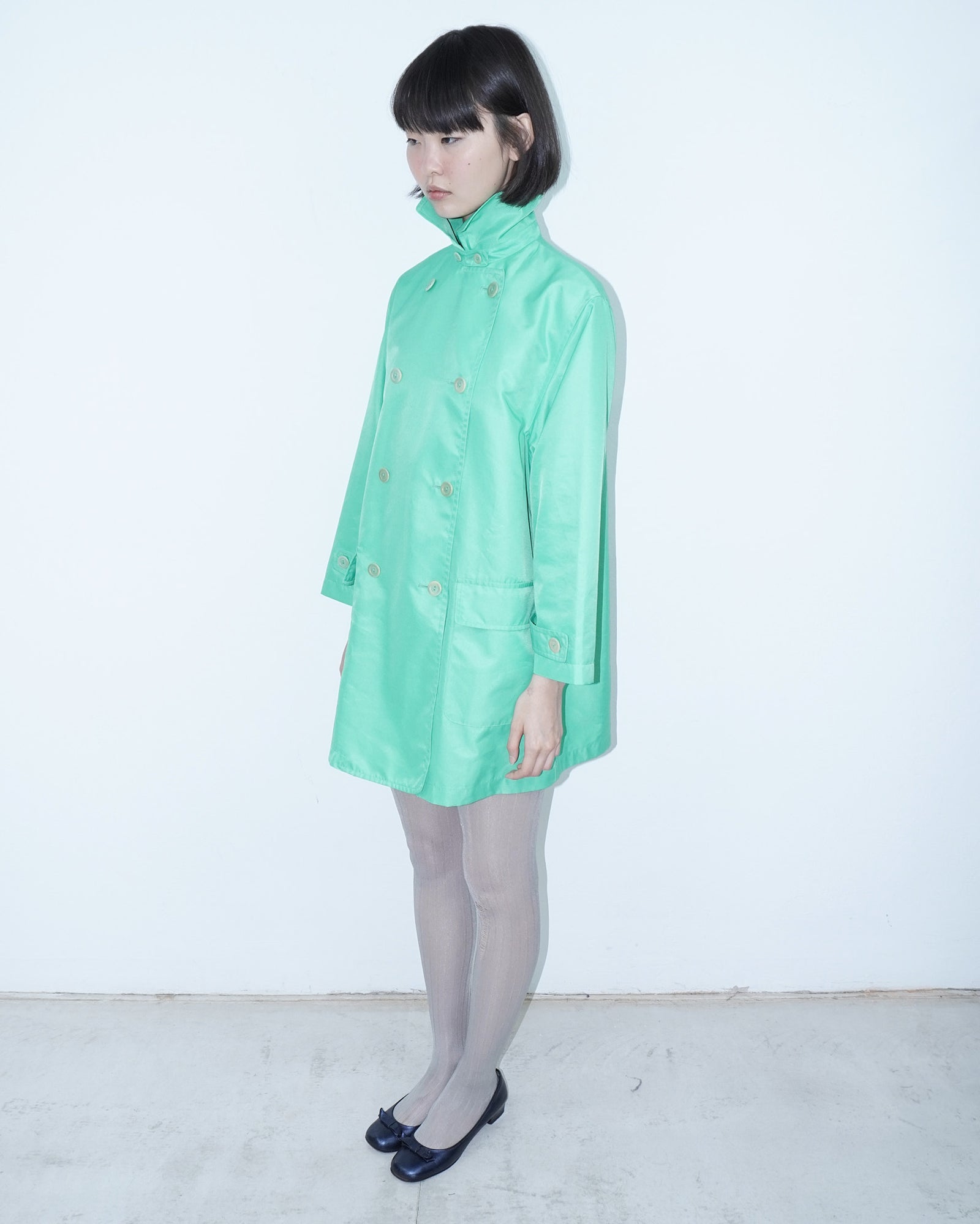 vibrant mint green trench coat