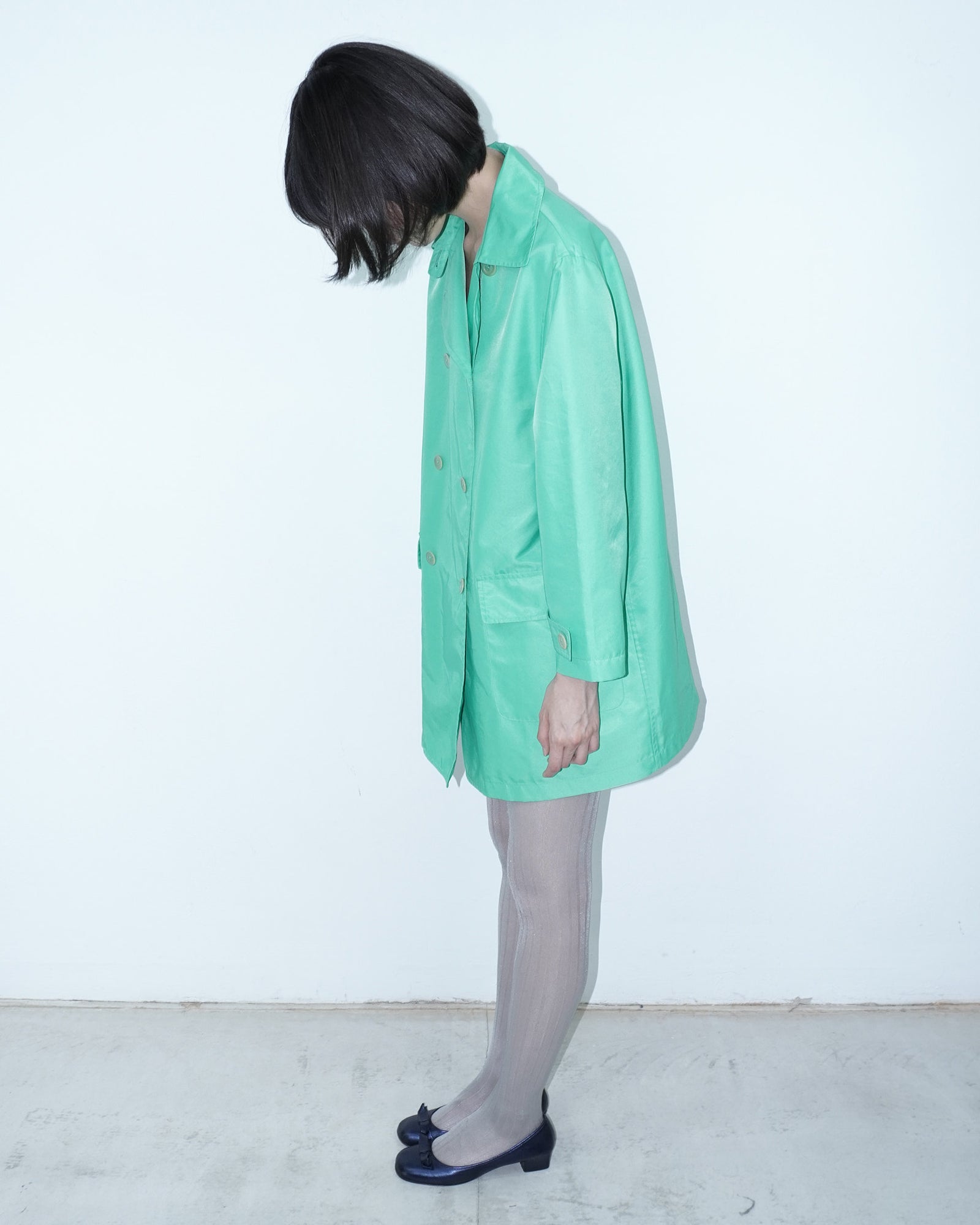 vibrant mint green trench coat