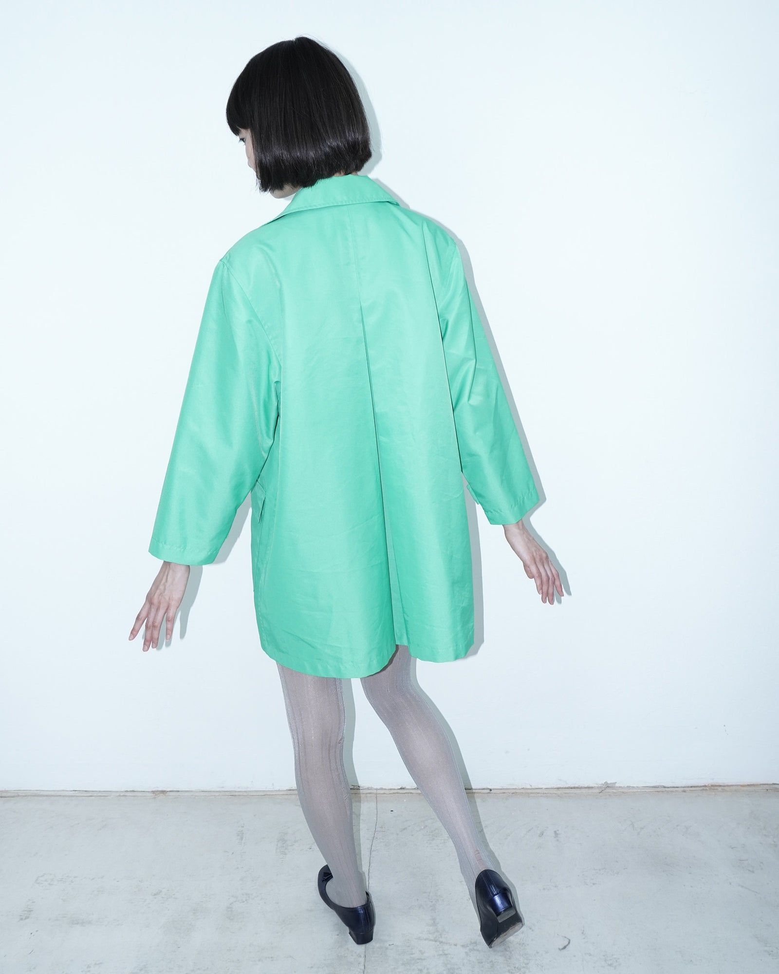 vibrant mint green trench coat