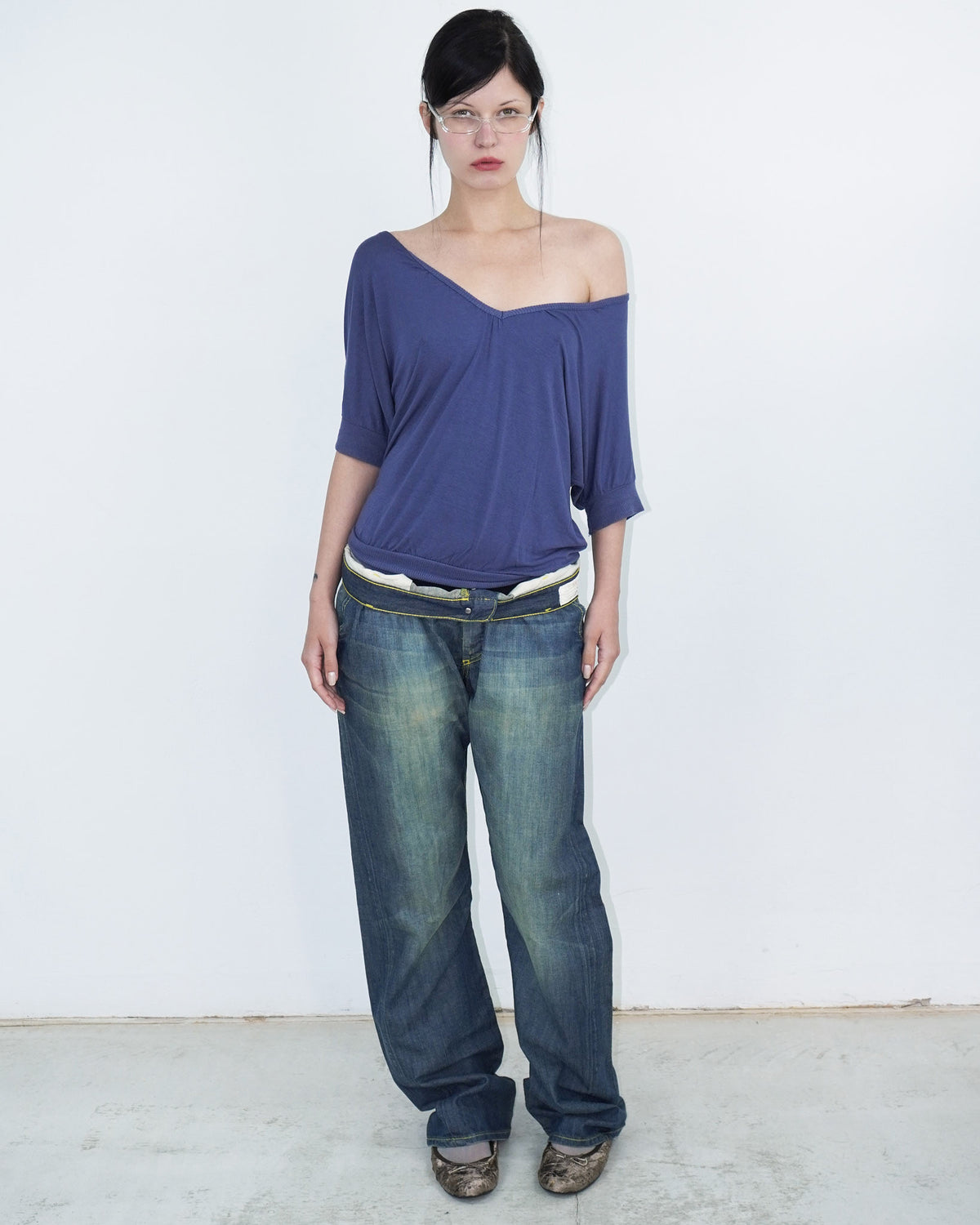 washed denim pants with yellow stitching details
