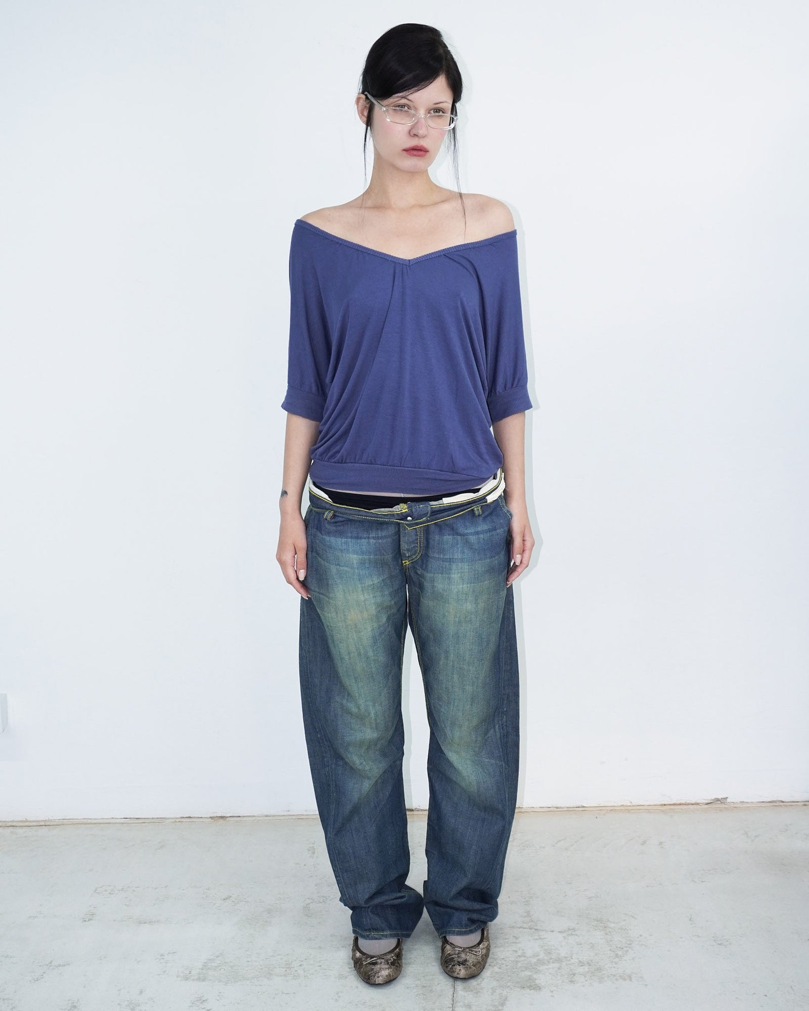 washed denim pants with yellow stitching details