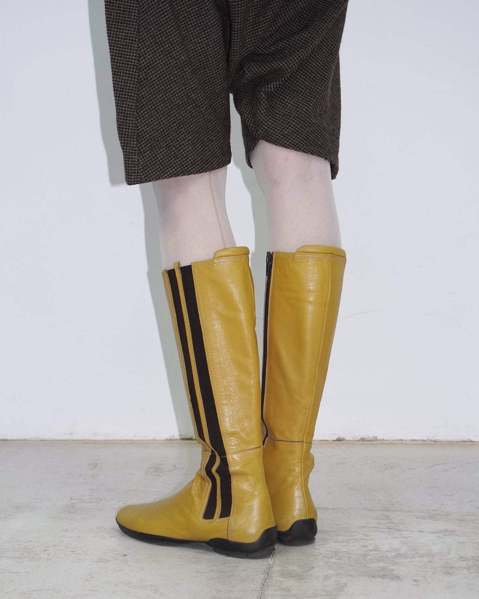 yellow leather knee-high boots