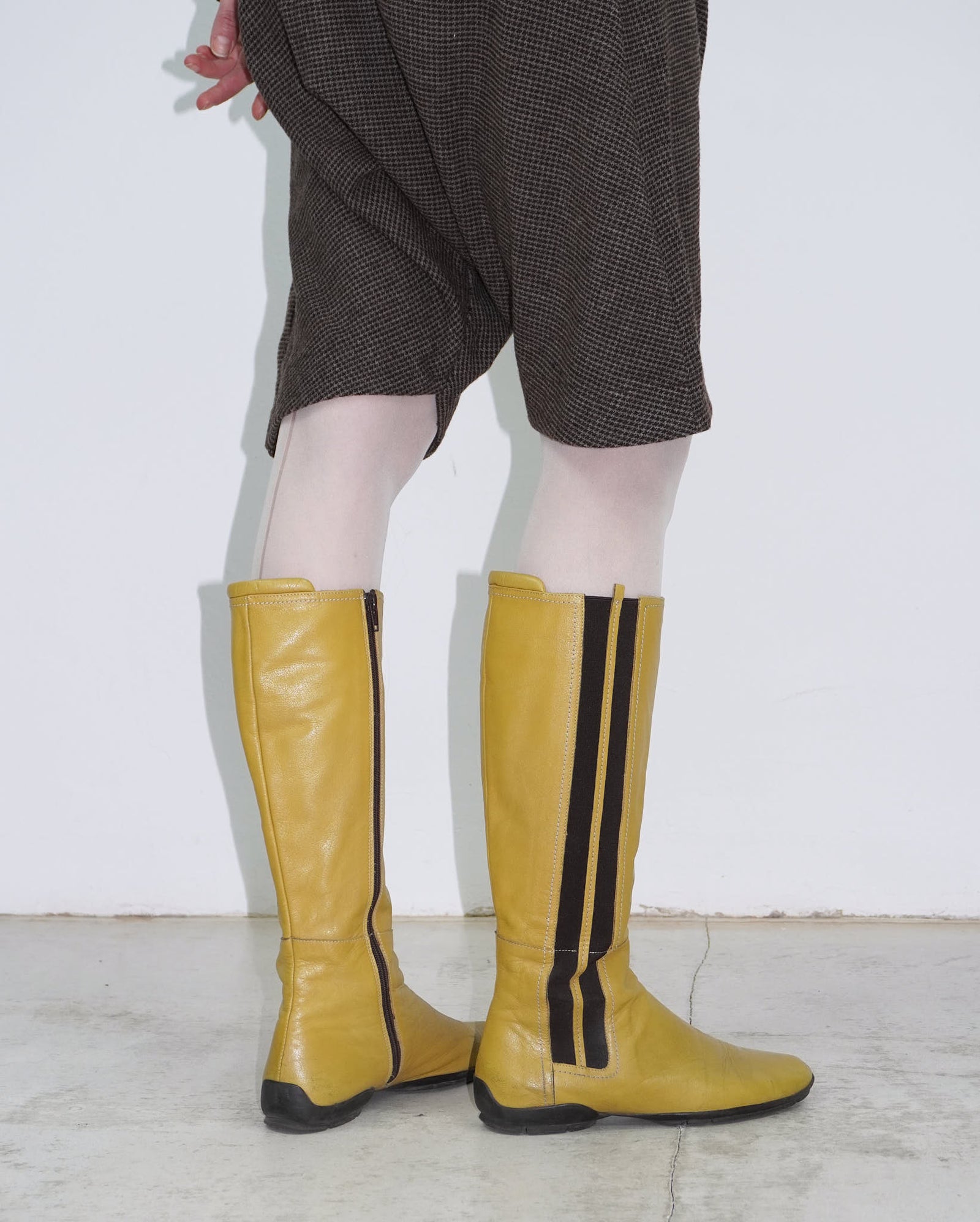 yellow leather knee-high boots
