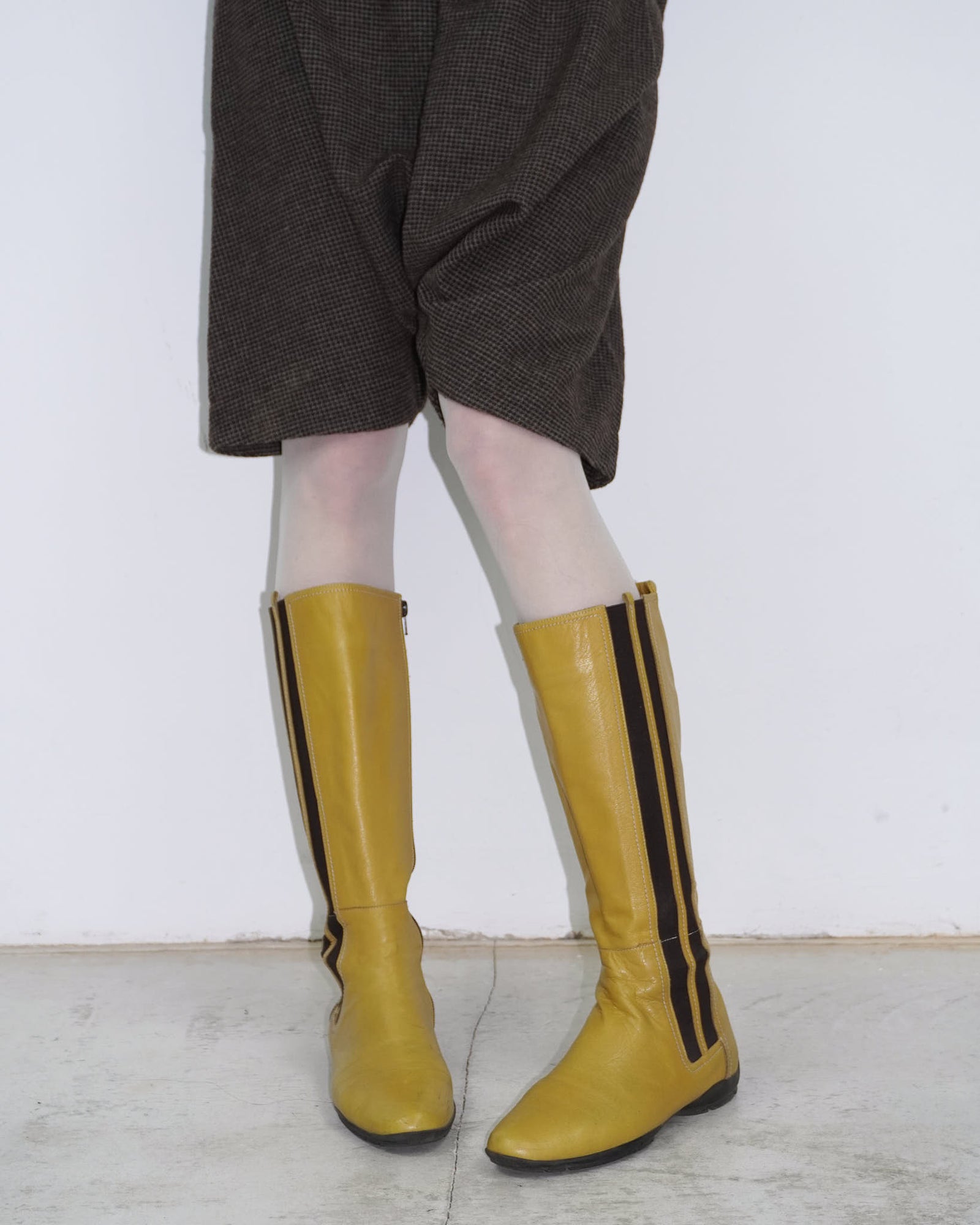 yellow leather knee-high boots