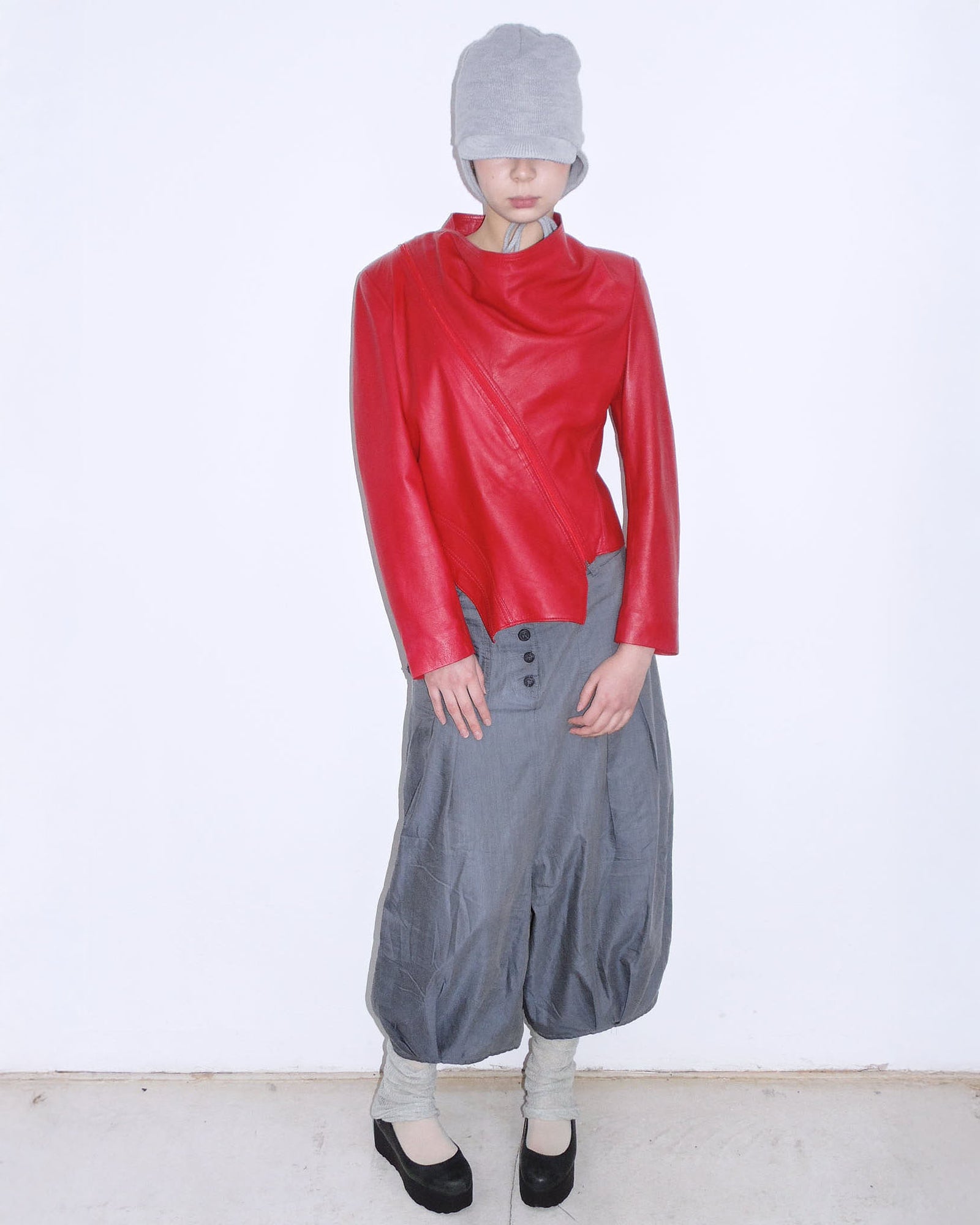 red asymmetrical oversized leather jacket