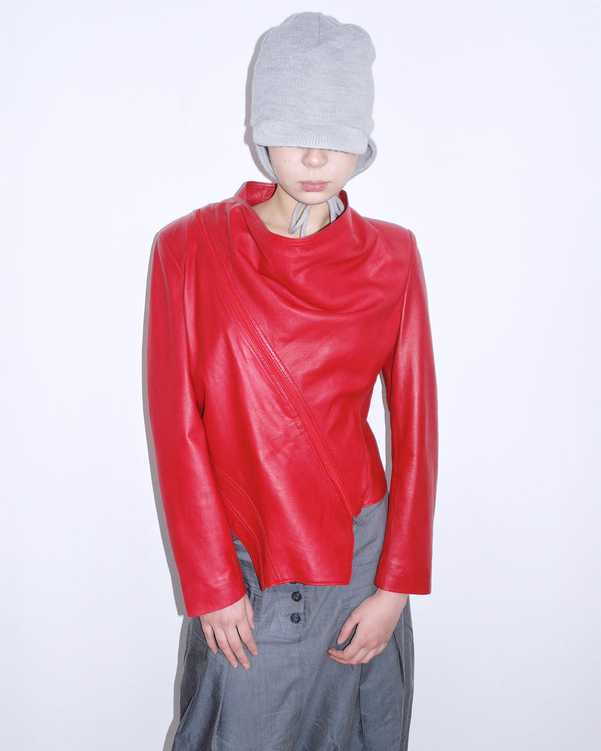 red asymmetrical oversized leather jacket