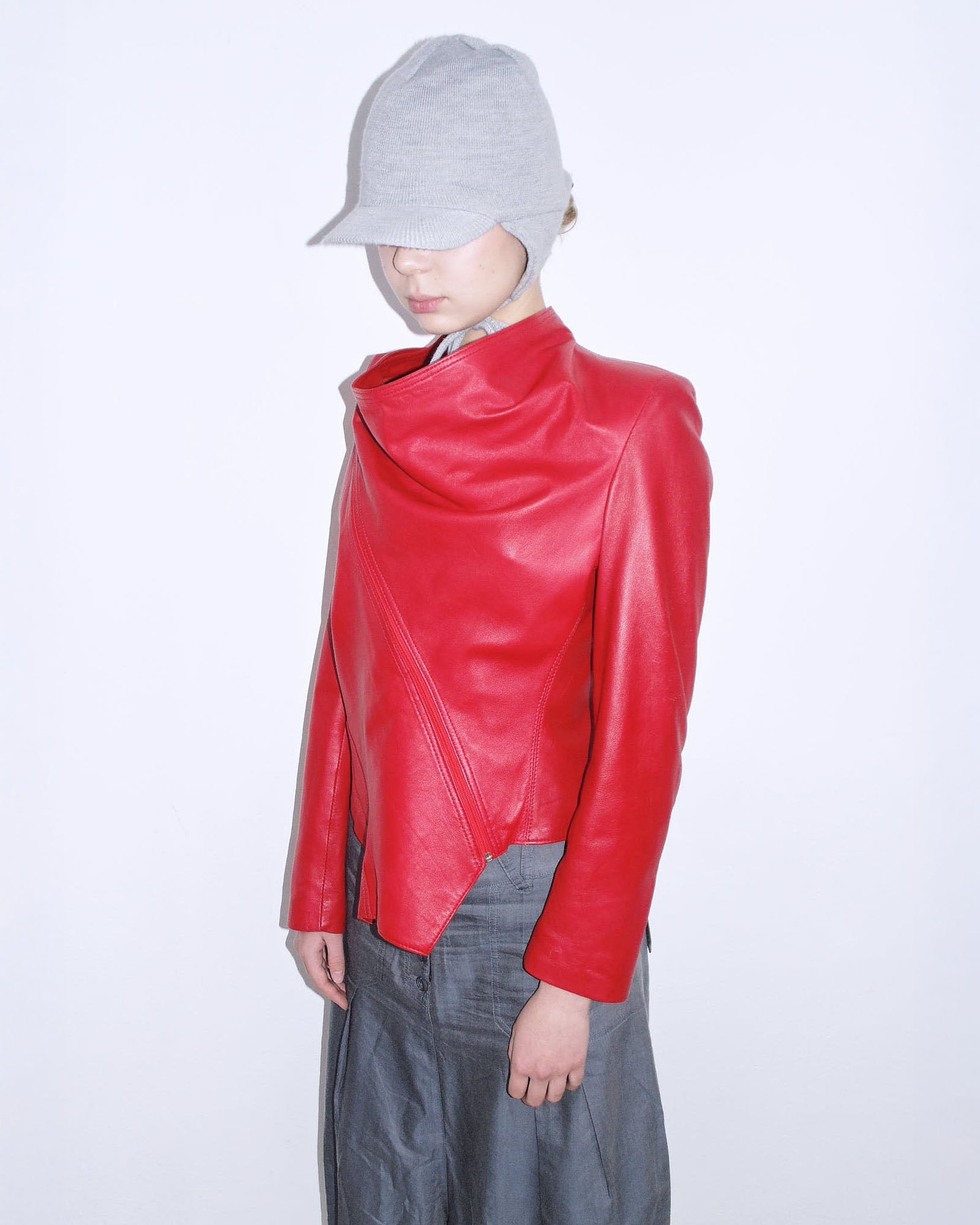 red asymmetrical oversized leather jacket