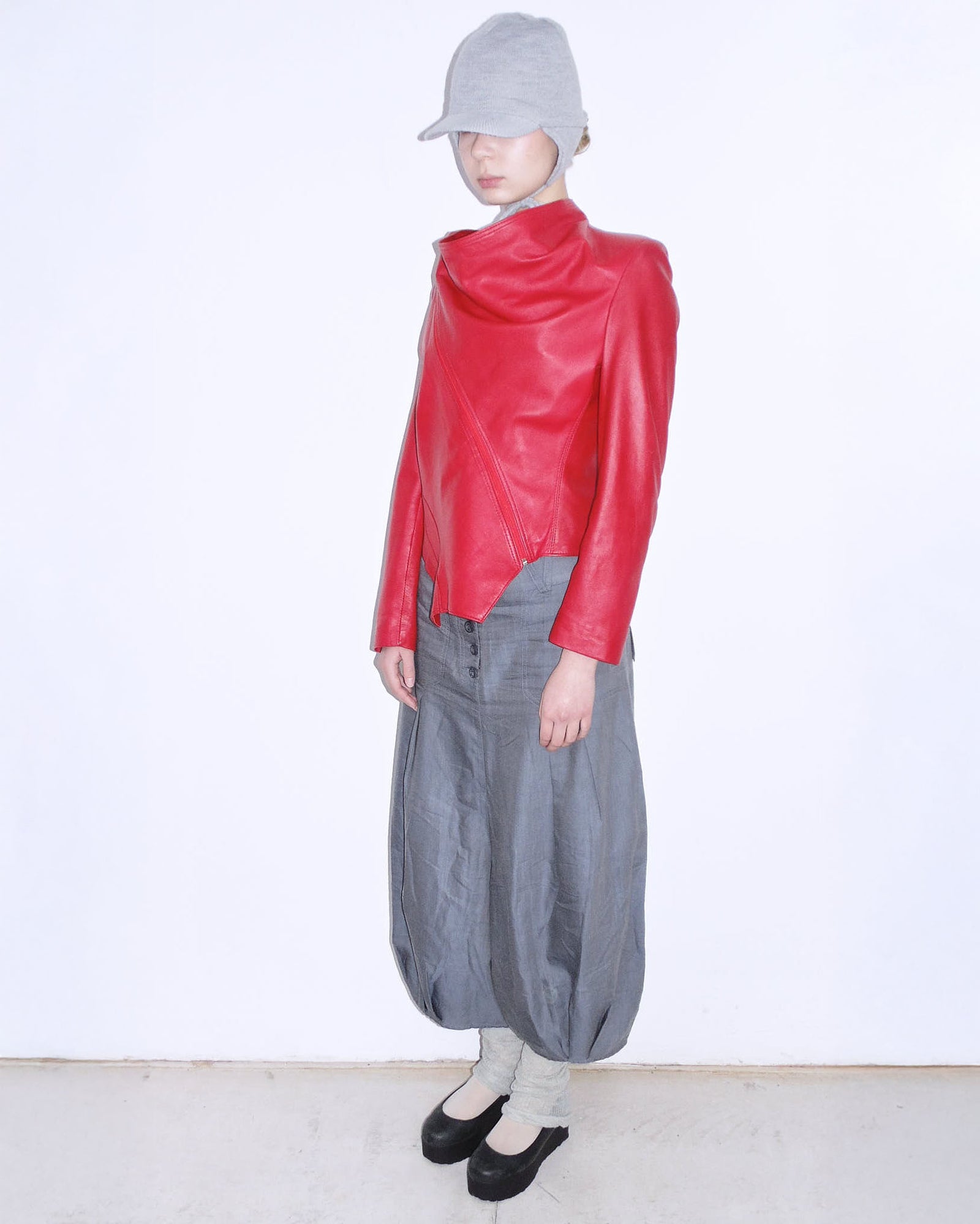 red asymmetrical oversized leather jacket