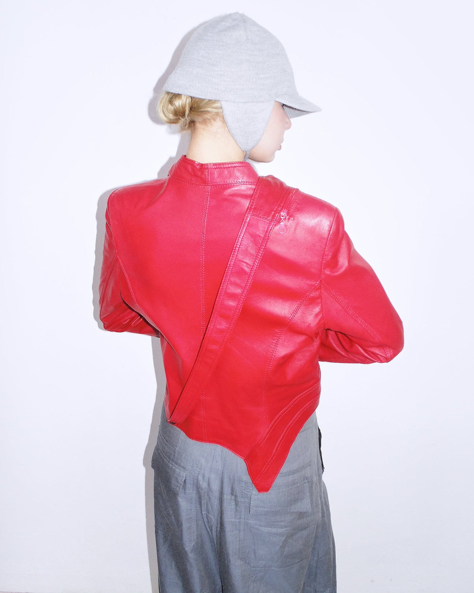 red asymmetrical oversized leather jacket