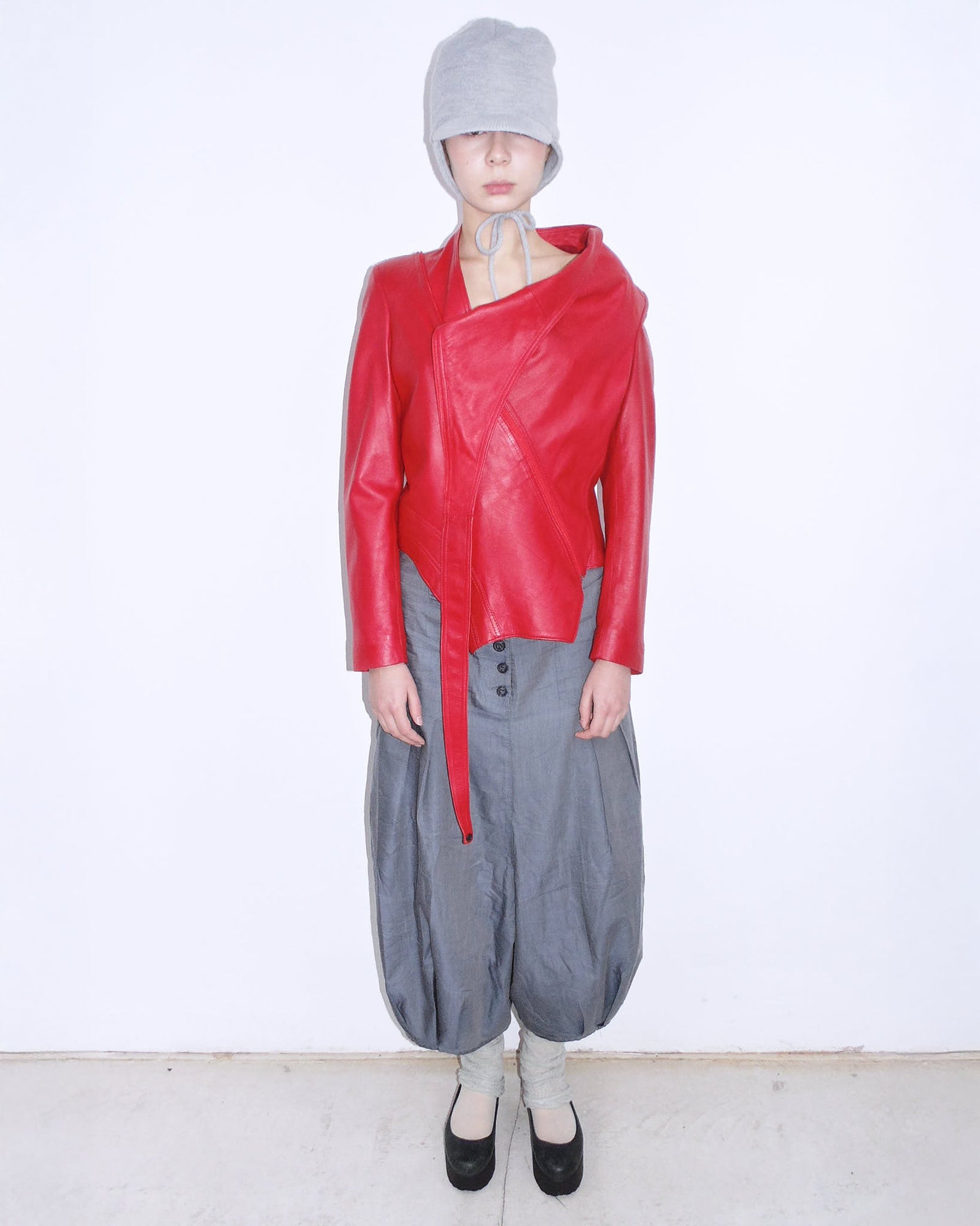red asymmetrical oversized leather jacket