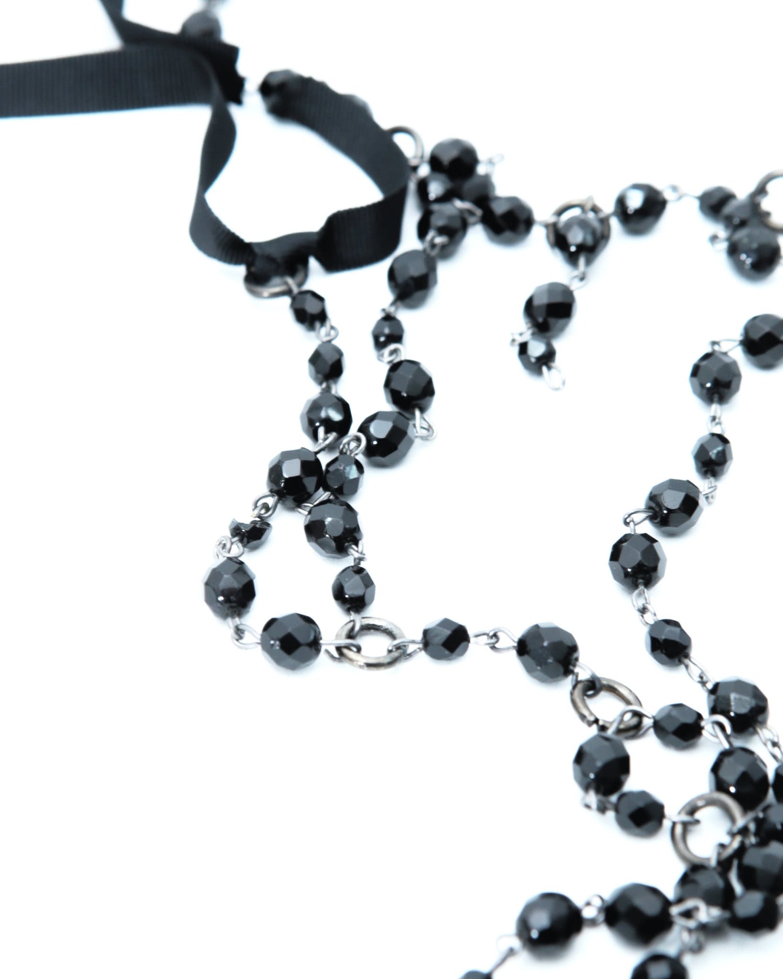black beaded necklace with ribbon ties