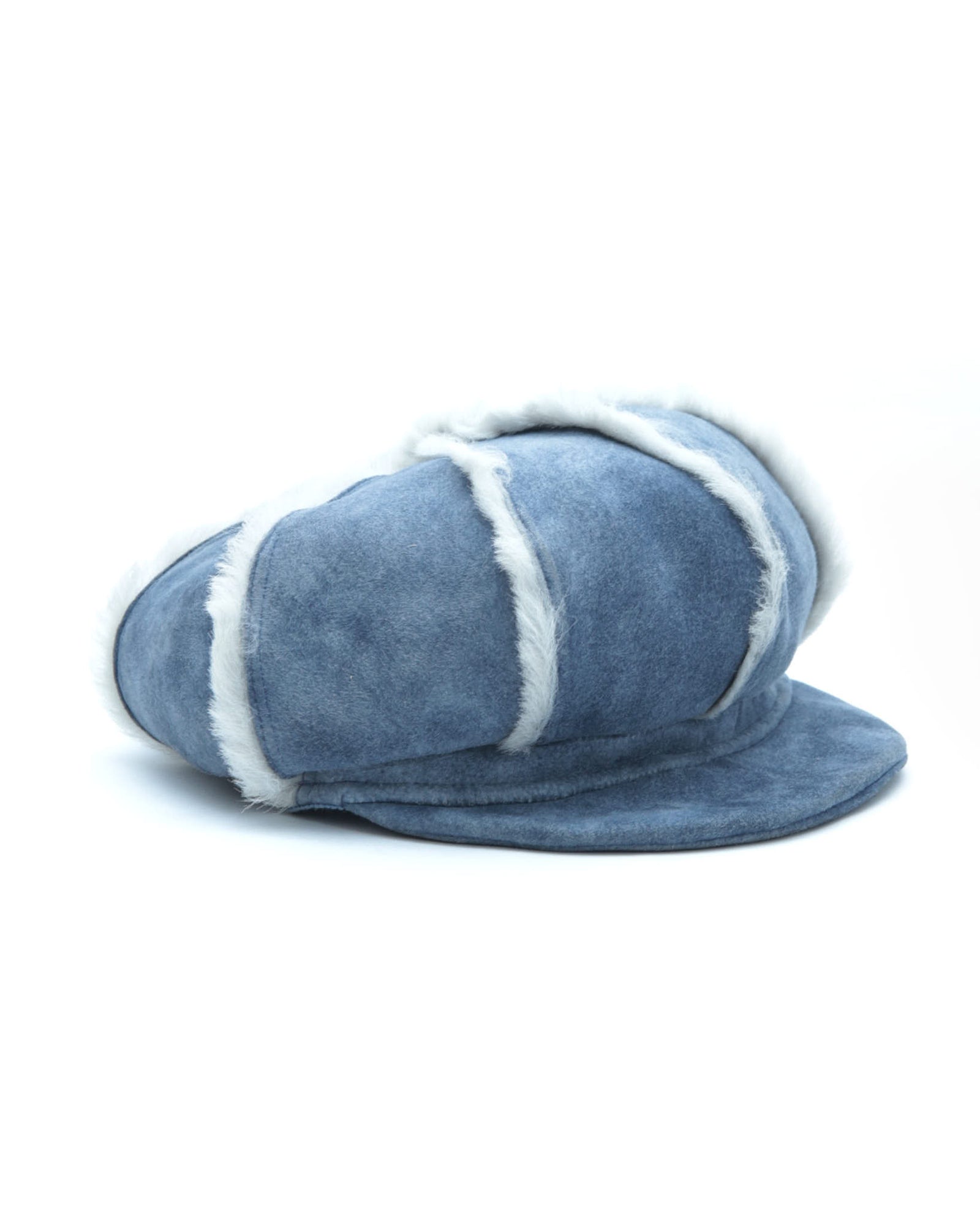 blue suede cap with shearling trim