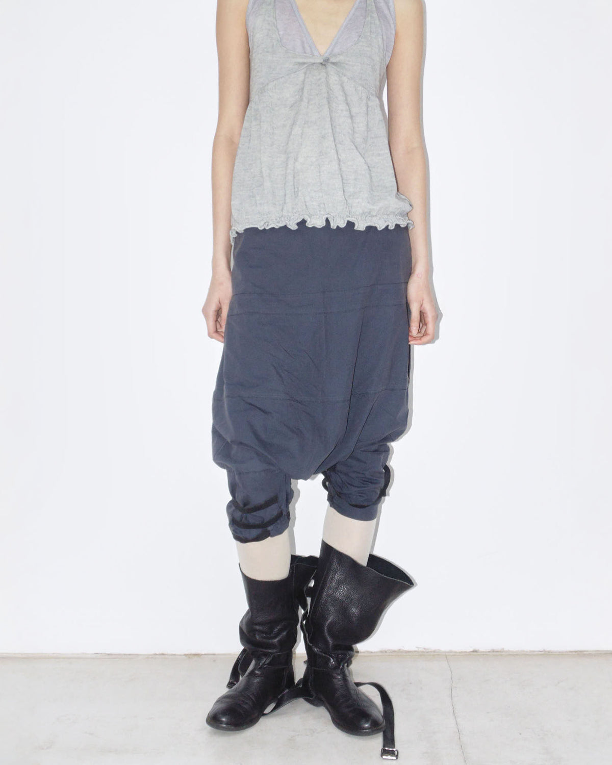 dark blue capri pants with elastic straps
