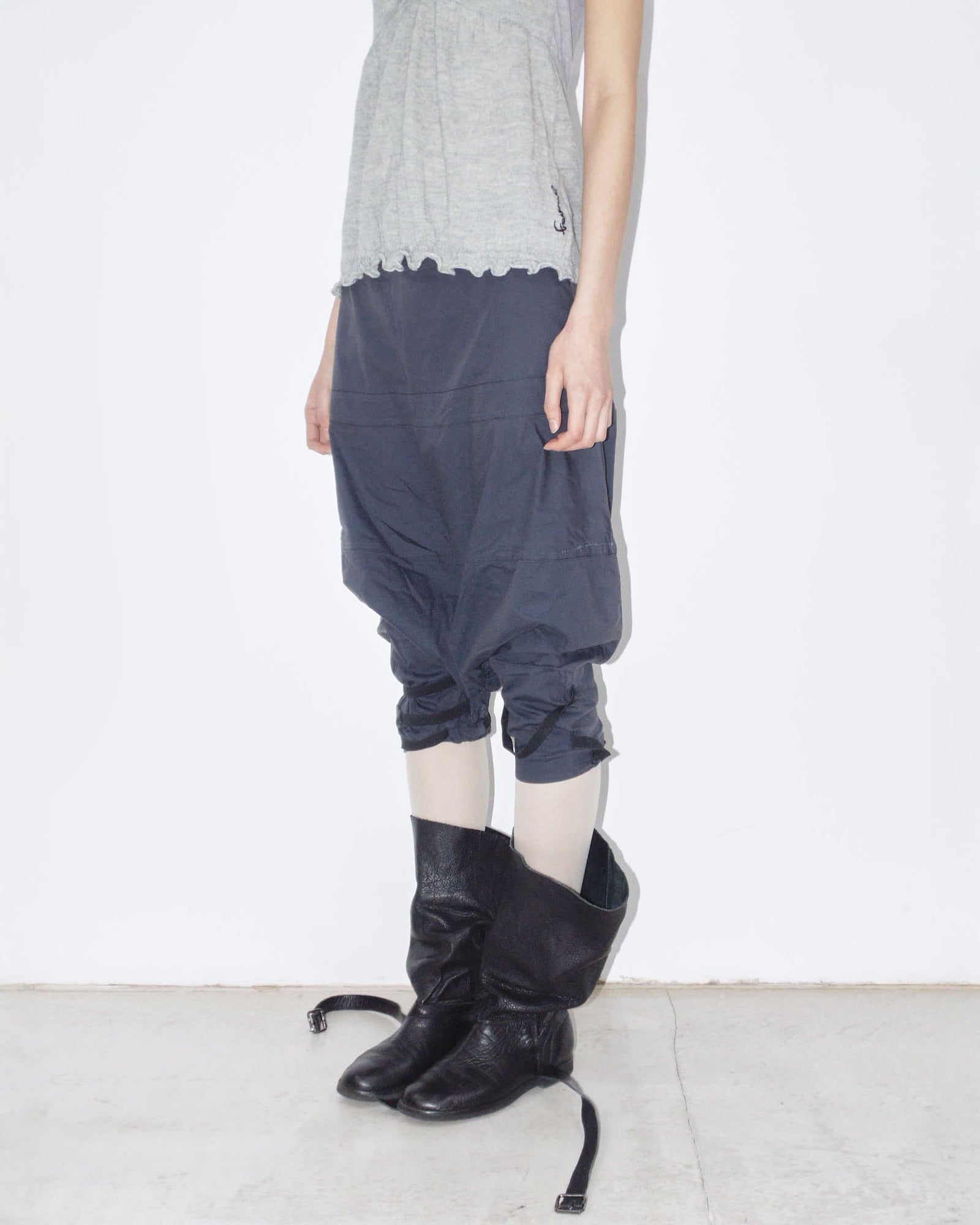 dark blue capri pants with elastic straps