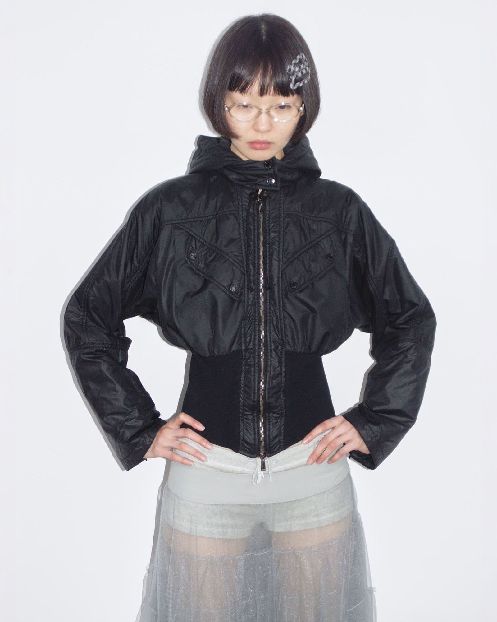 black hooded puffer jacket with cinched waist