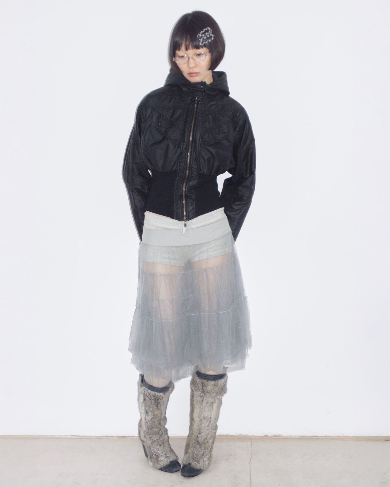 black hooded puffer jacket with cinched waist