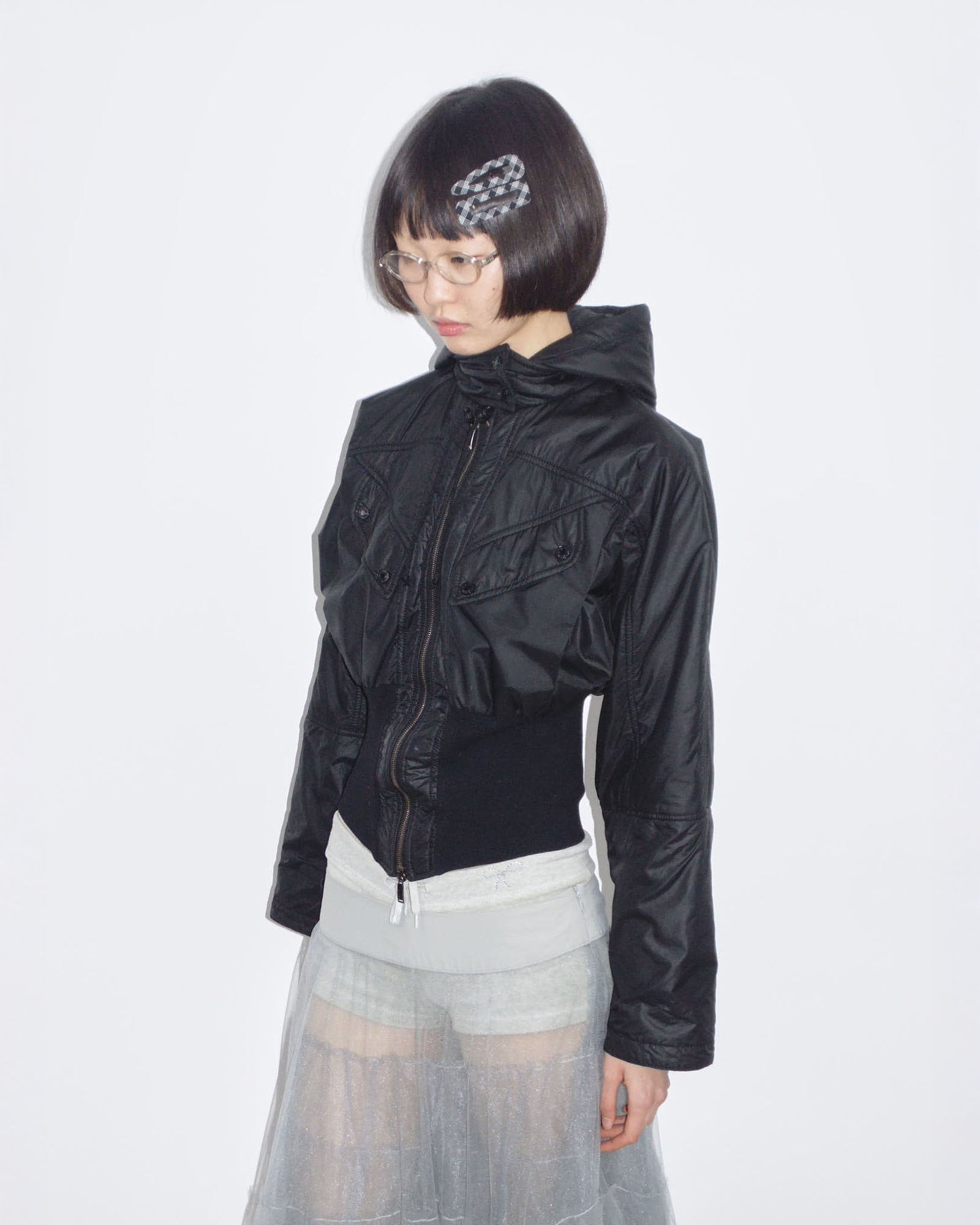 black hooded puffer jacket with cinched waist