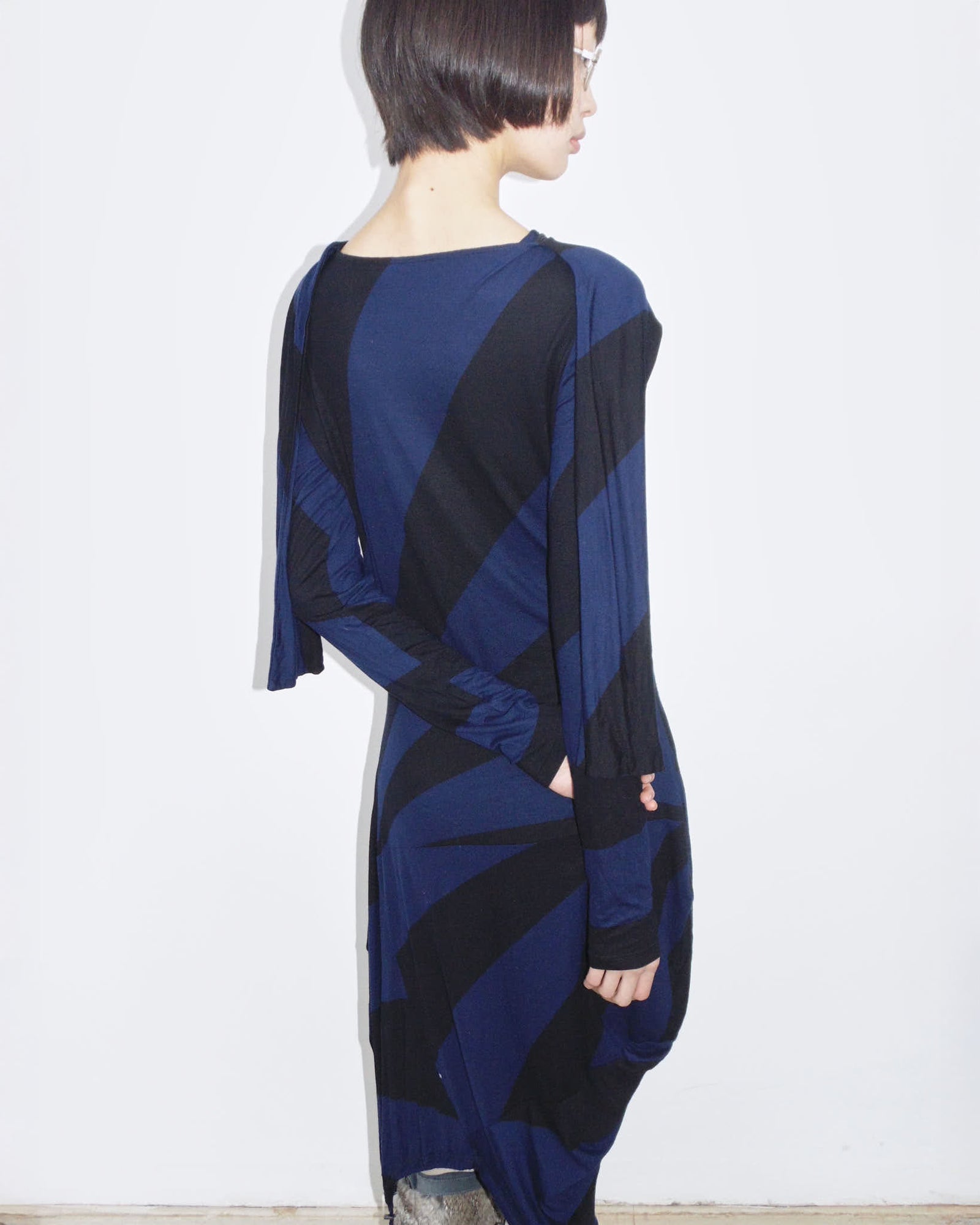 dark blue and black long sleeve sculptural dress
