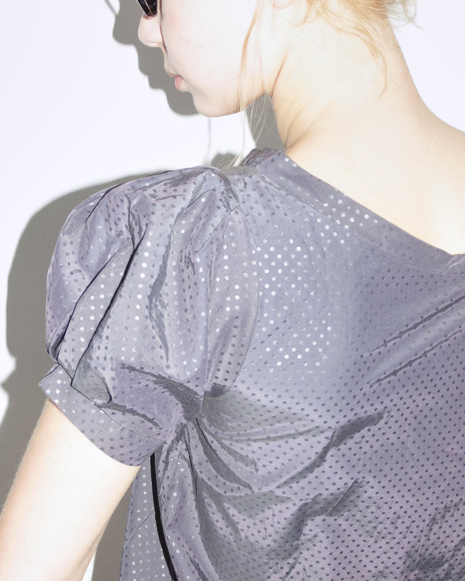 dark purple polka dot puff dress with cockade