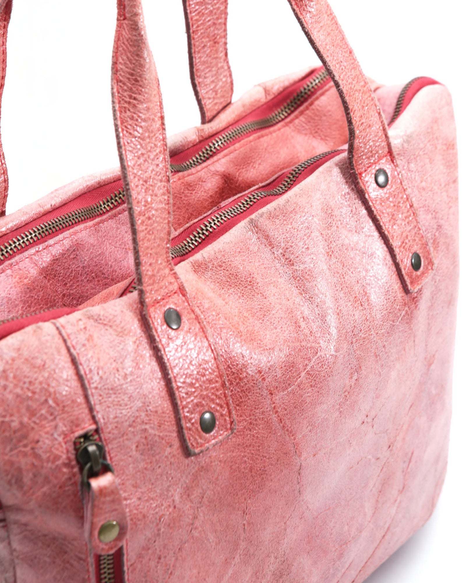 faded red leather crossbody bag
