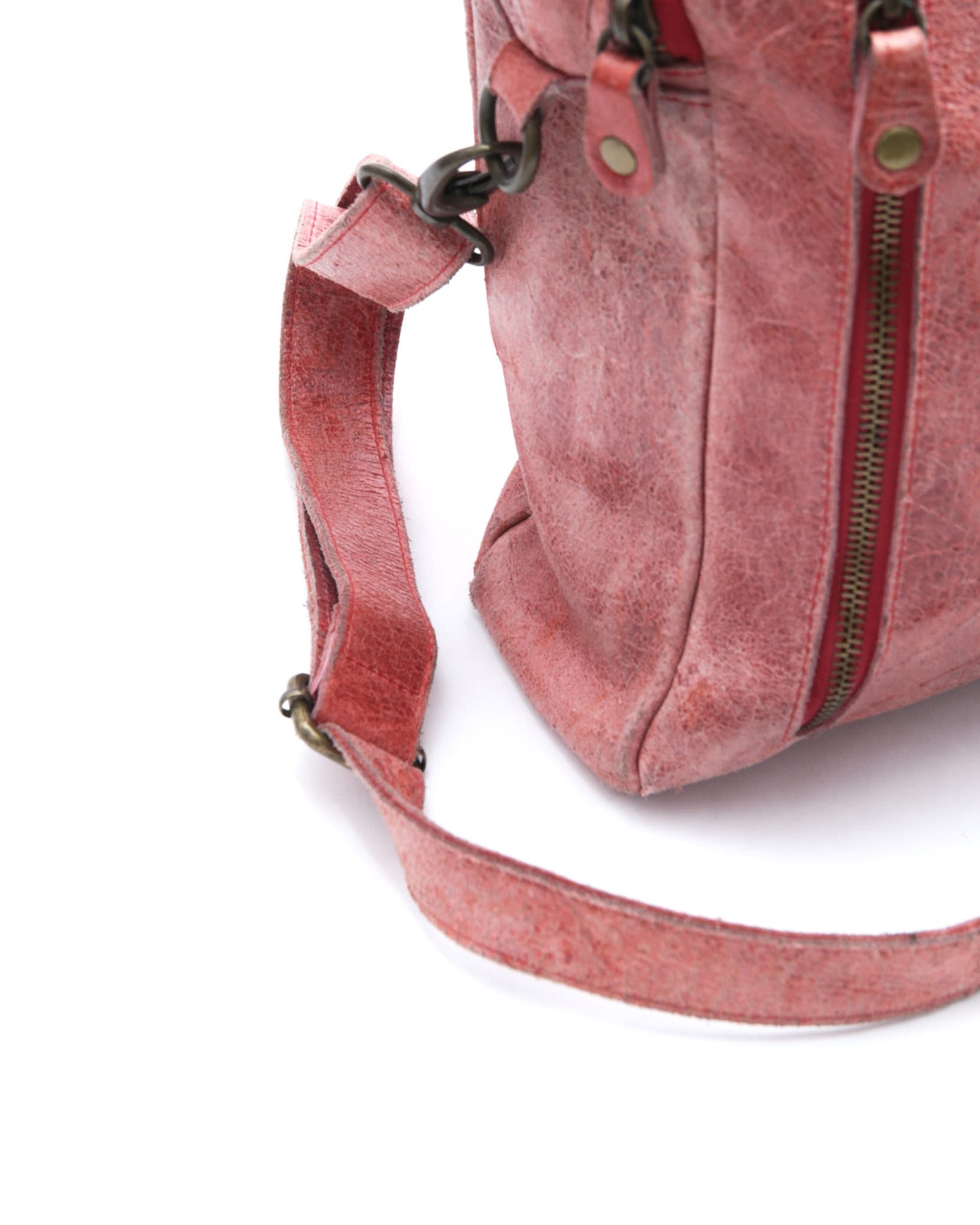 faded red leather crossbody bag