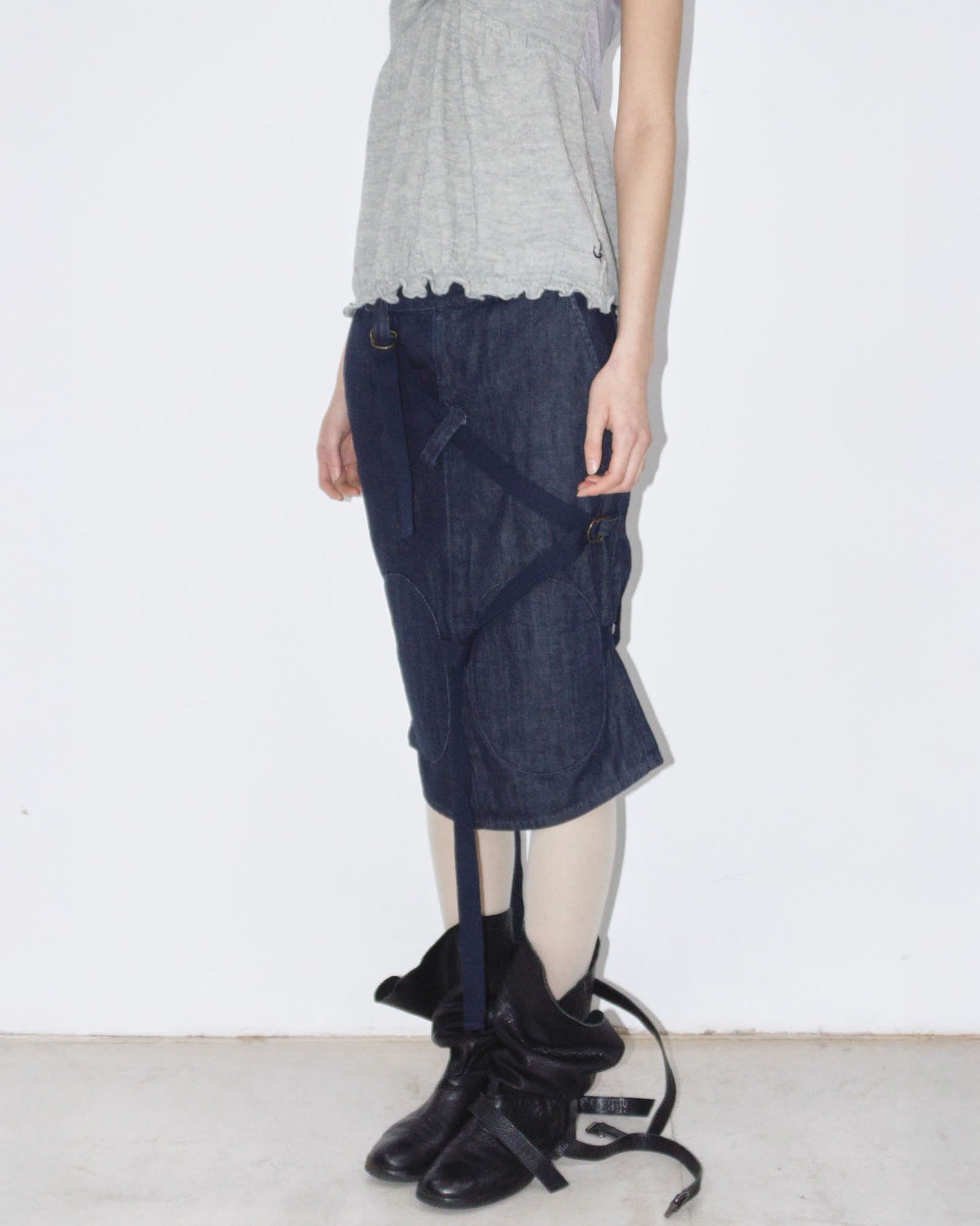 dark denim midi skirt with strap details