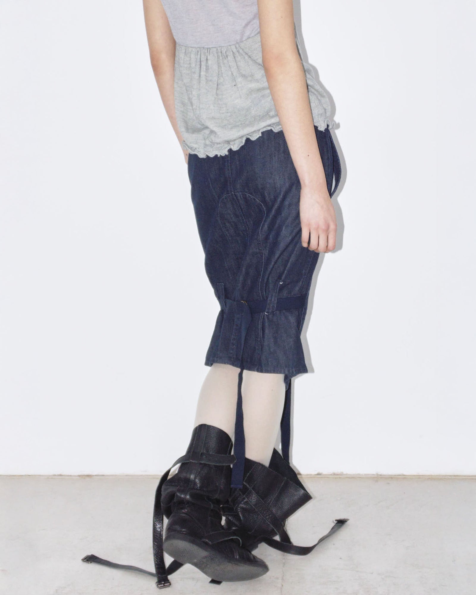 dark denim midi skirt with strap details