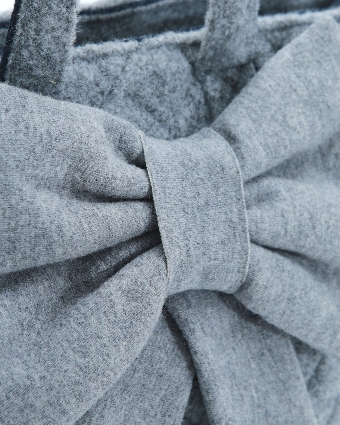gray quilted wool tote with bow