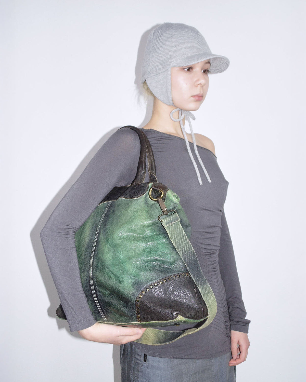 green and black leather shoulder bag