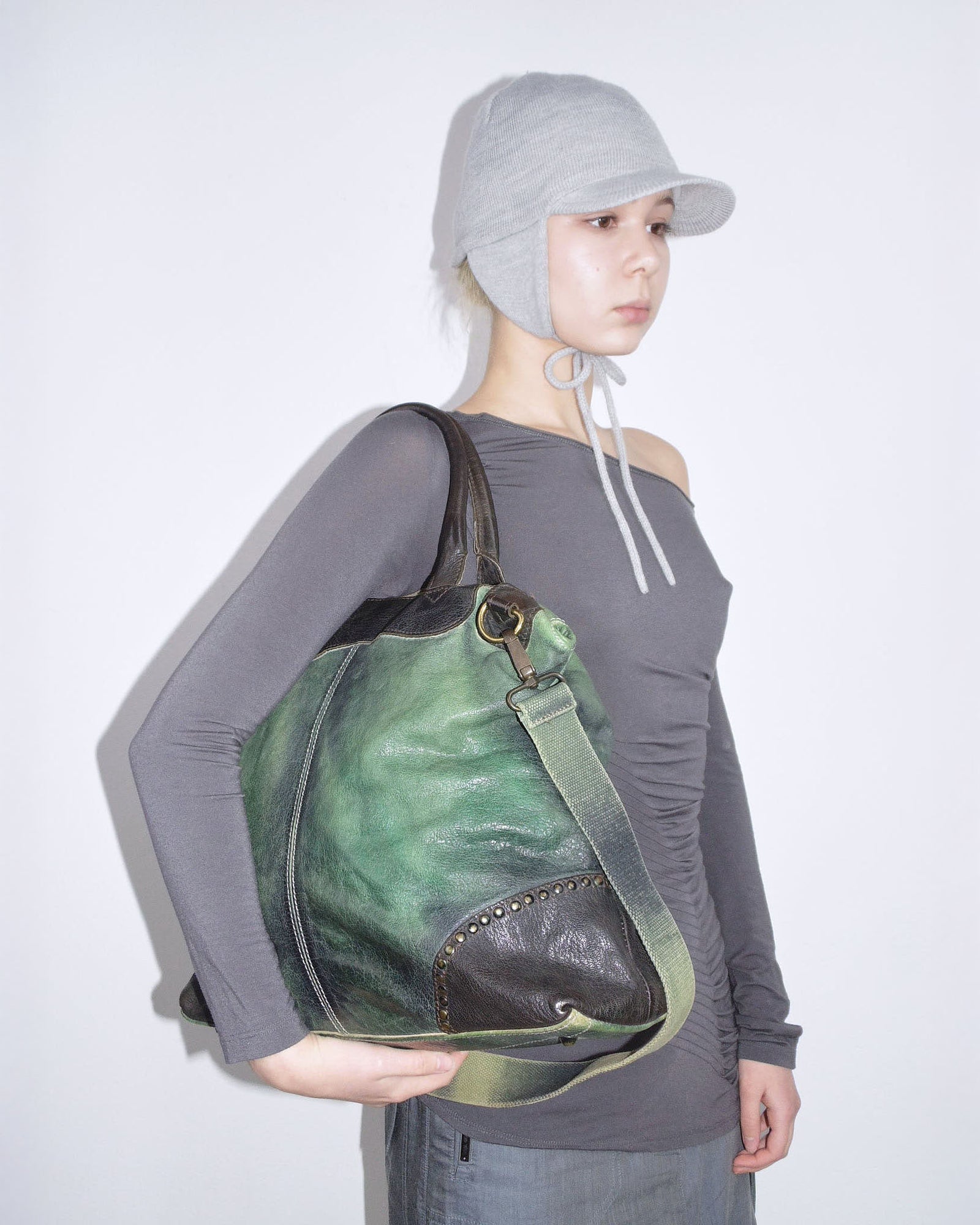 green and black leather shoulder bag