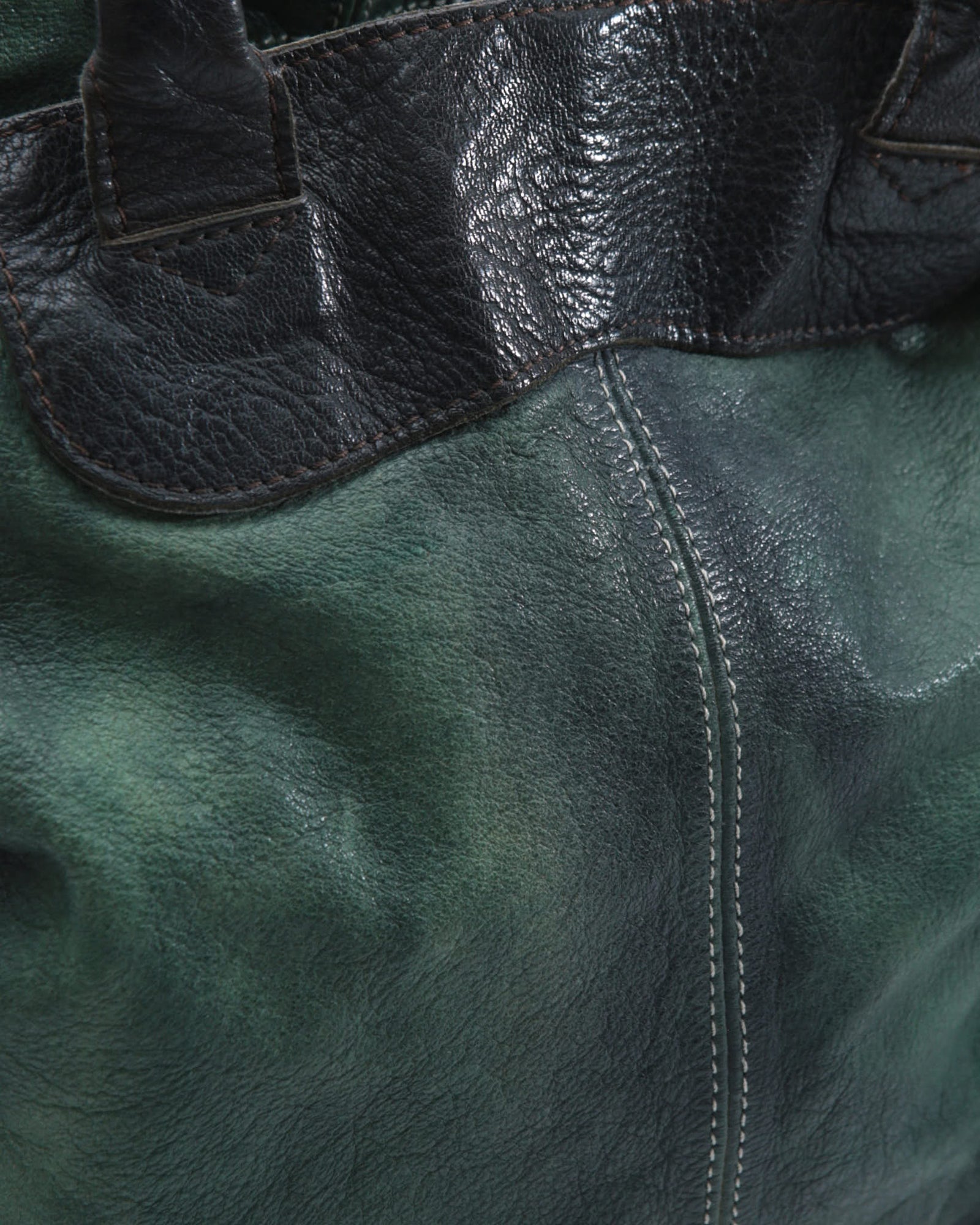 green and black leather shoulder bag