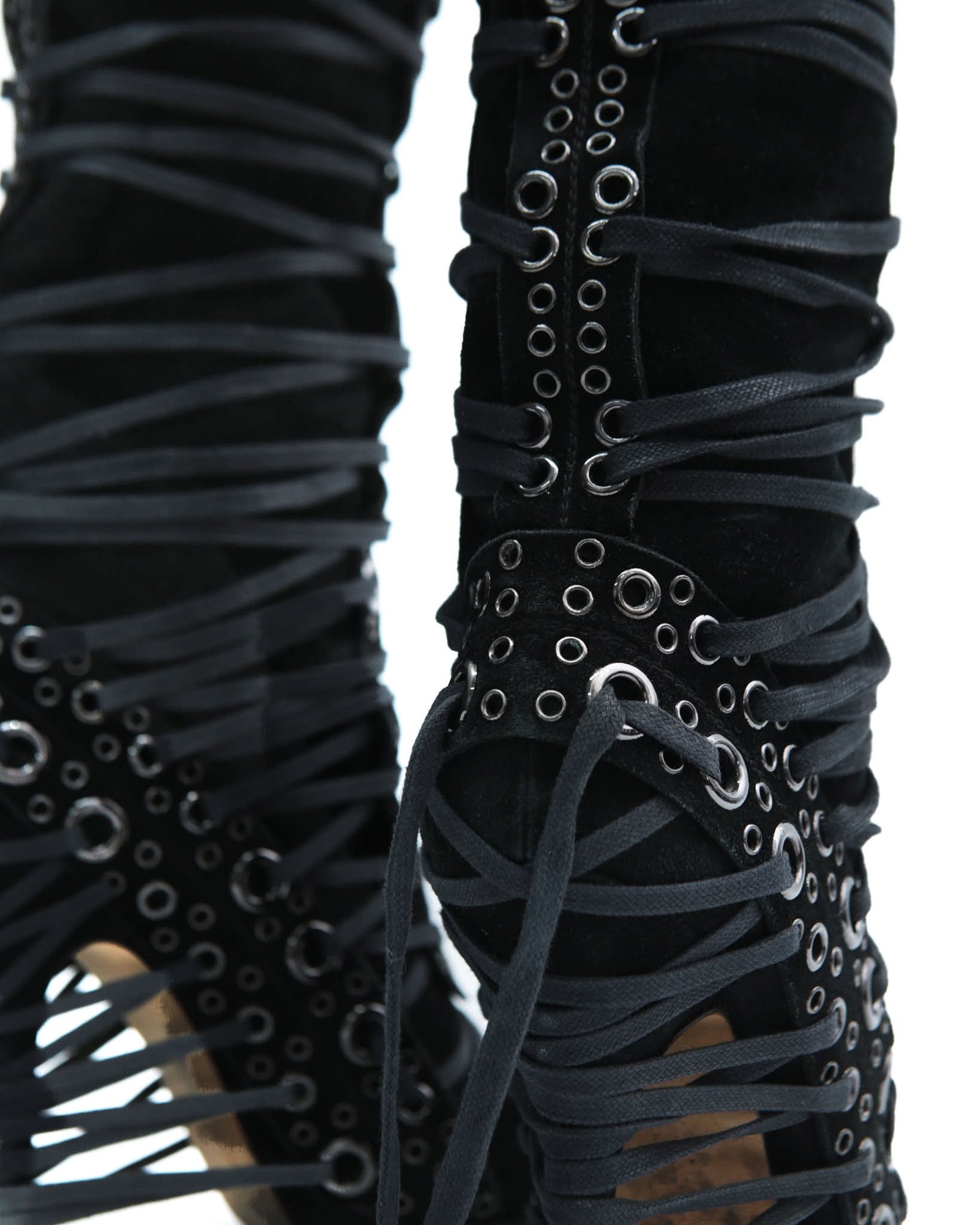 black lace-up knee-high boots with eyelets